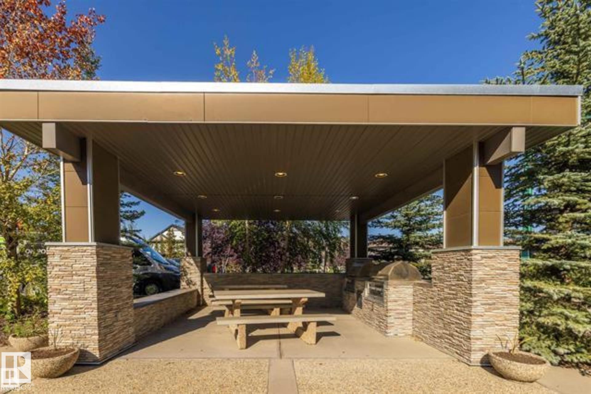 View of patio / terrace with area for grilling - 407 2590 Anderson Way, Edmonton, AB - Outdoor With Deck Patio Veranda