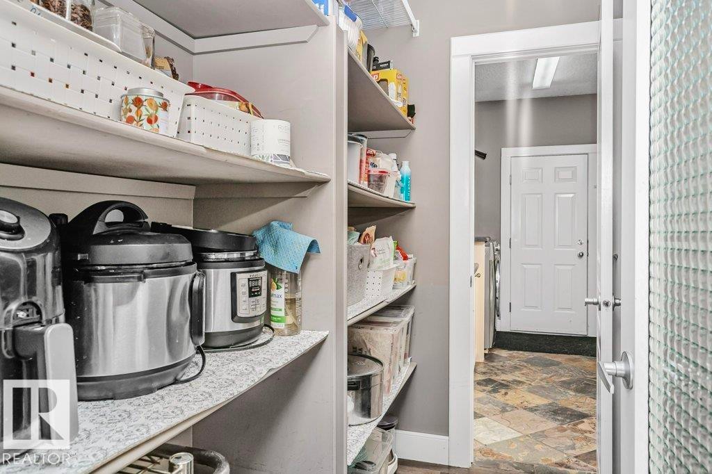 View of storage area - 1579 Hector Road, Edmonton, AB - Indoor Photo Showing Other Room
