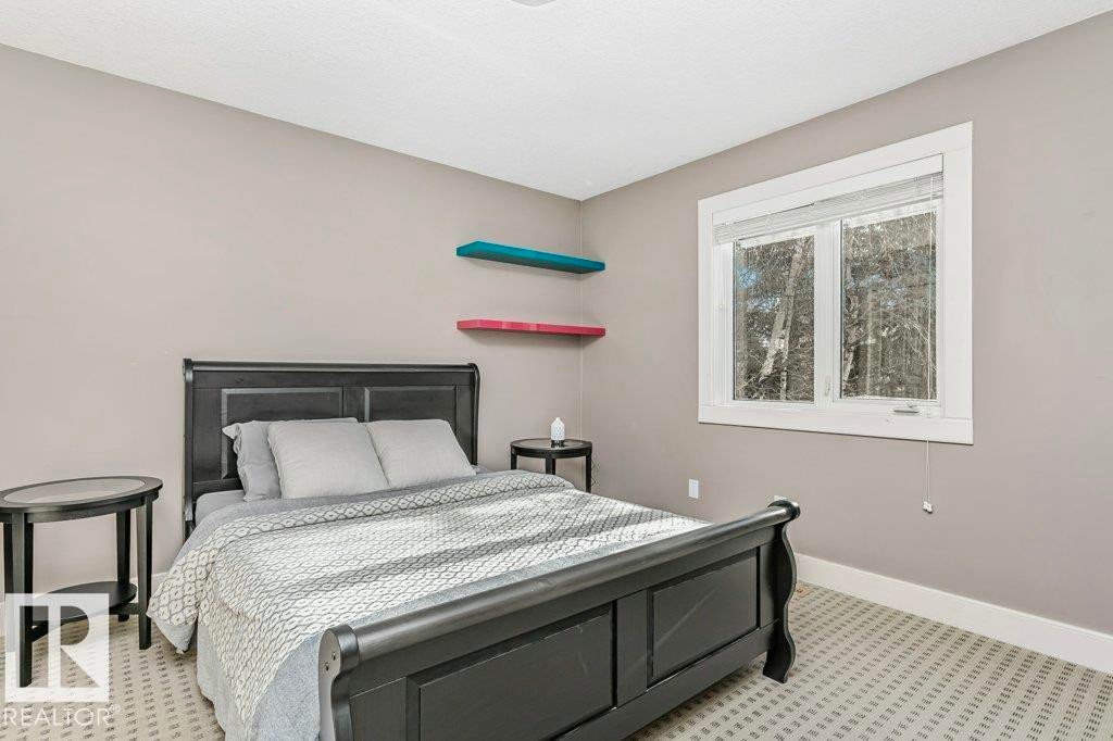 Bedroom with light colored carpet and baseboards - 1579 Hector Road, Edmonton, AB - Indoor Photo Showing Bedroom