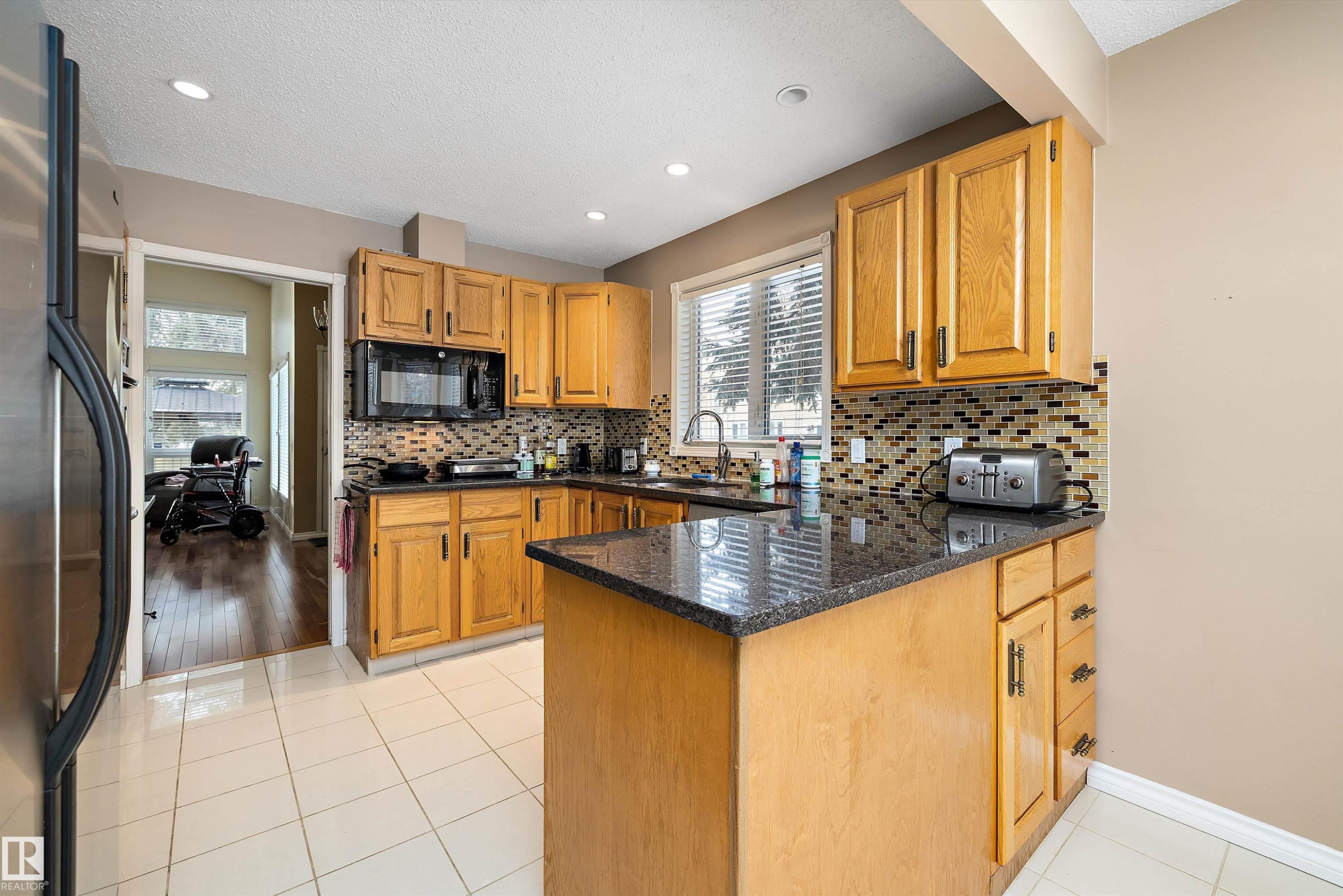 1027 109 Street, Edmonton, AB - Indoor Photo Showing Kitchen With Double Sink