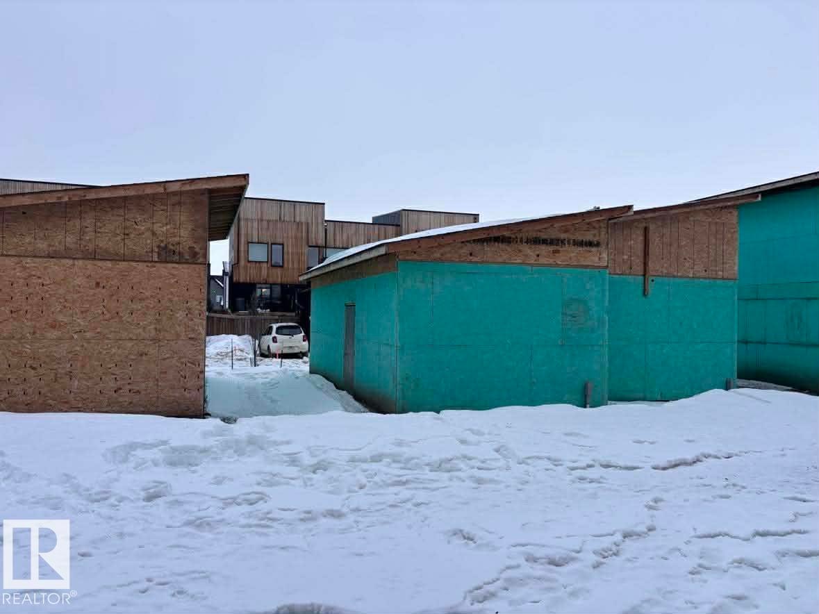 Snow covered property - 2750 Blatchford Road Nw, Edmonton, AB - Outdoor