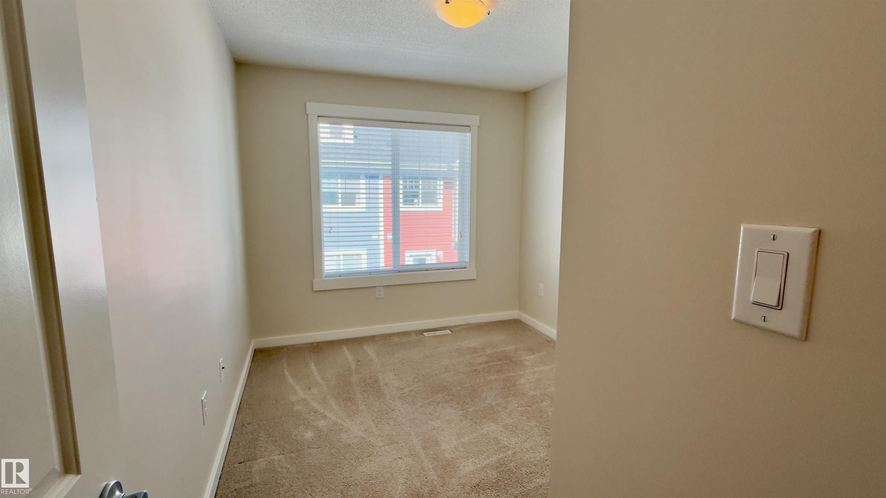 96 903 Crystallina Nera Way, Edmonton, AB - Indoor Photo Showing Other Room