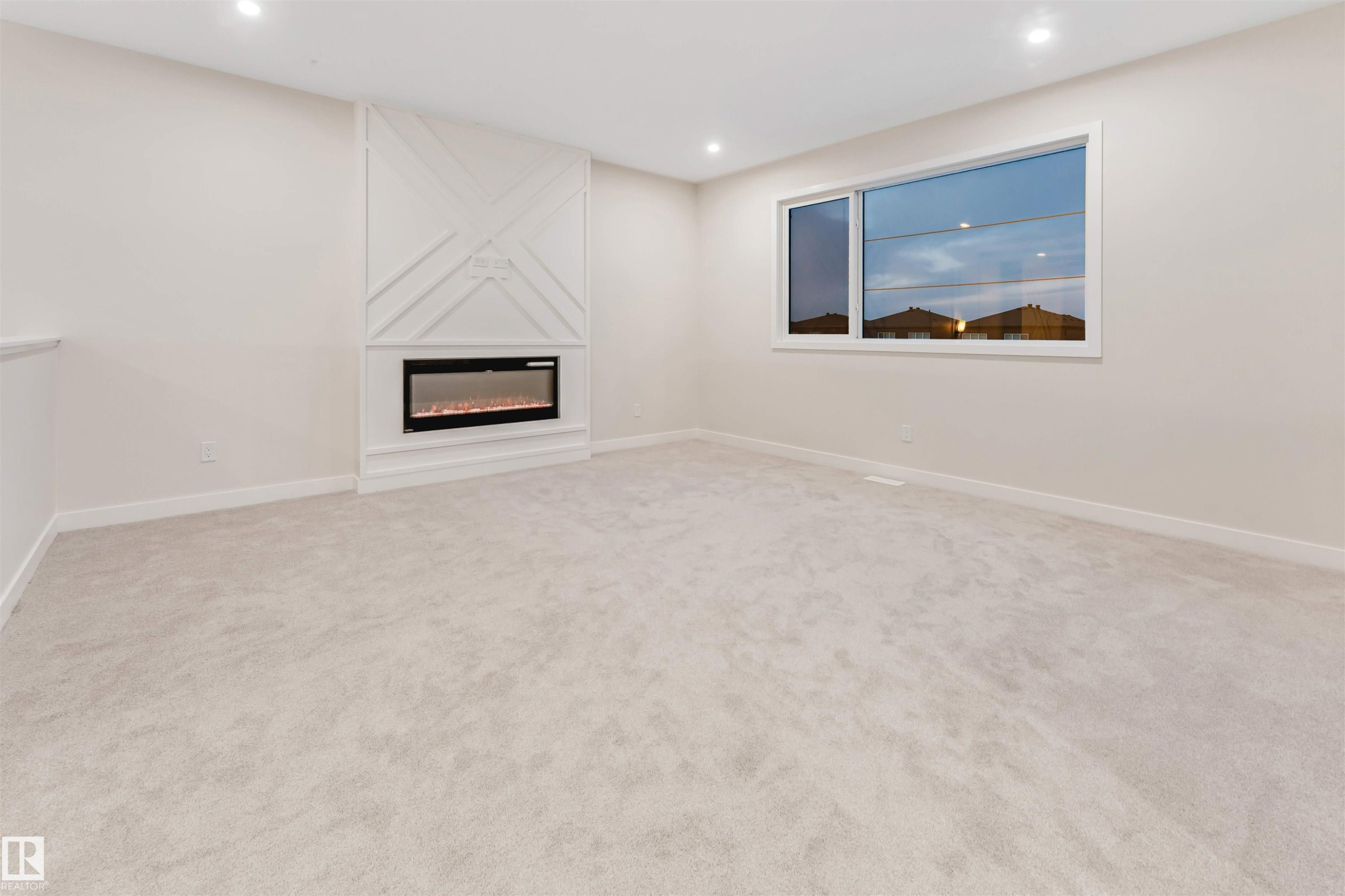 5807 Kootook Link Link, Edmonton, AB - Indoor Photo Showing Other Room With Fireplace