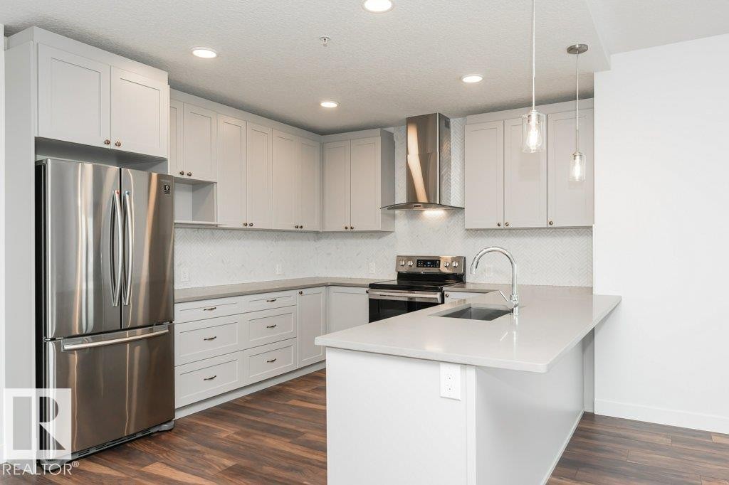 306 1316 Windermere Way, Edmonton, AB - Indoor Photo Showing Kitchen With Upgraded Kitchen
