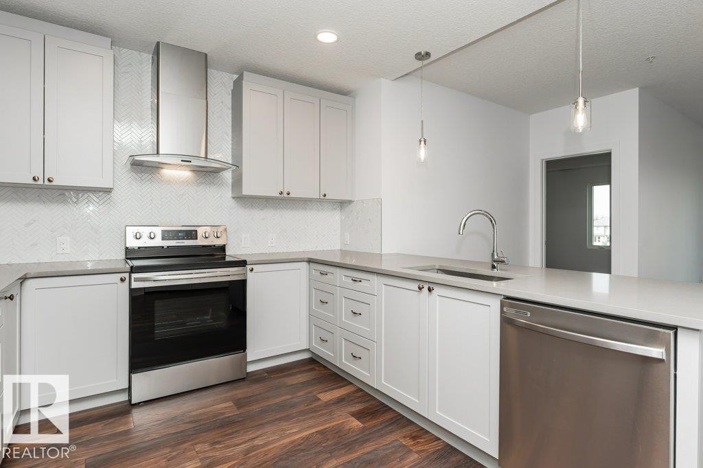 306 1316 Windermere Way, Edmonton, AB - Indoor Photo Showing Kitchen With Upgraded Kitchen