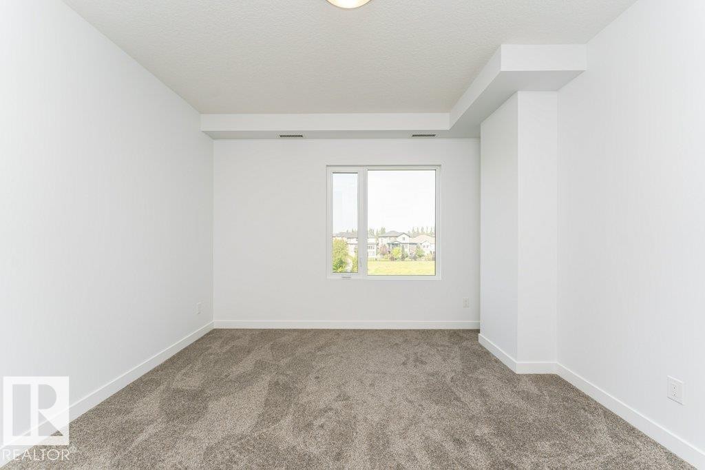 306 1316 Windermere Way, Edmonton, AB - Indoor Photo Showing Other Room