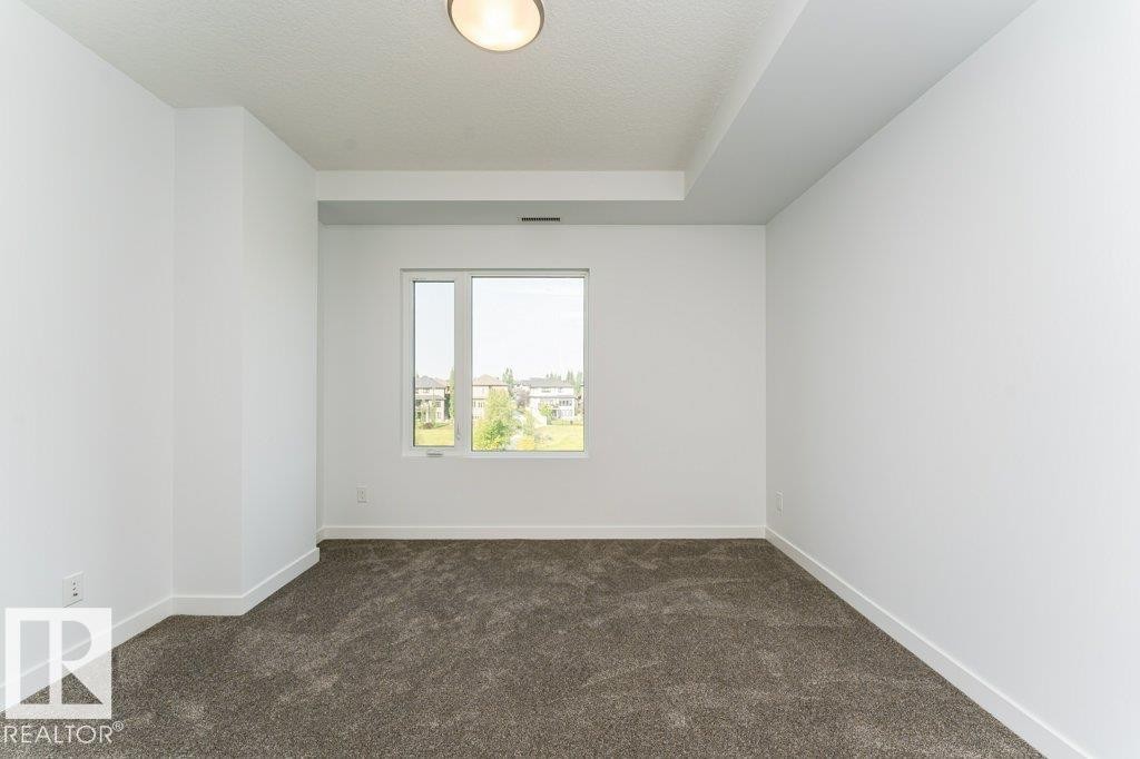 306 1316 Windermere Way, Edmonton, AB - Indoor Photo Showing Other Room