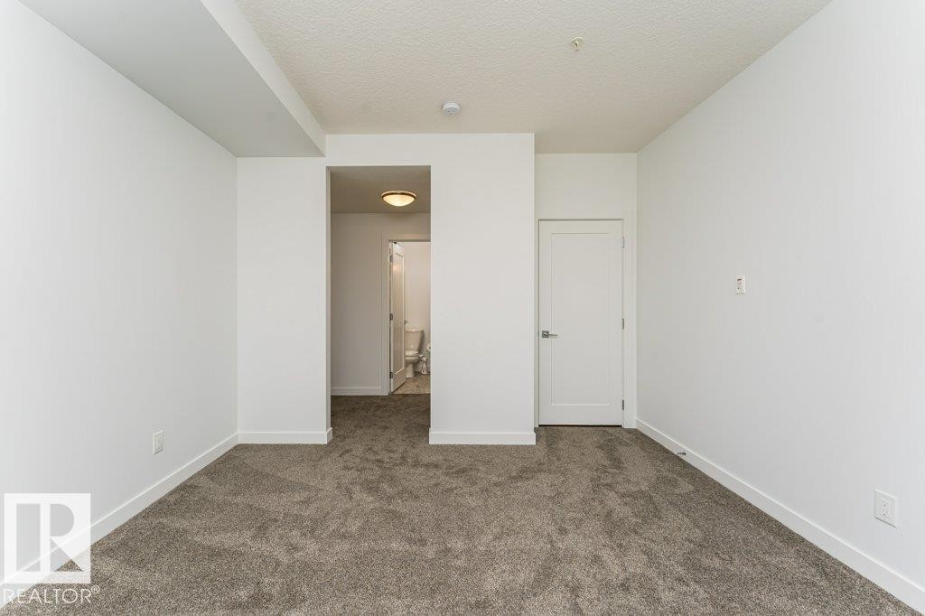 306 1316 Windermere Way, Edmonton, AB - Indoor Photo Showing Other Room