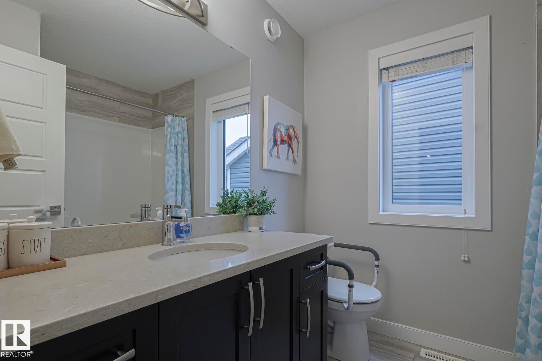 Bathroom with a shower with curtain and vanity - 2011 201 Street, Edmonton, AB - Indoor Photo Showing Bathroom