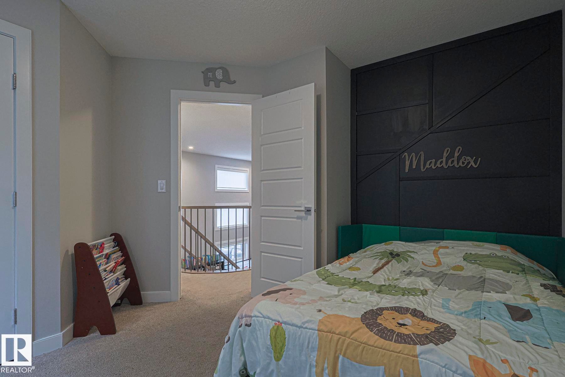 Bedroom with light carpet and baseboards - 2011 201 Street, Edmonton, AB - Indoor Photo Showing Bedroom