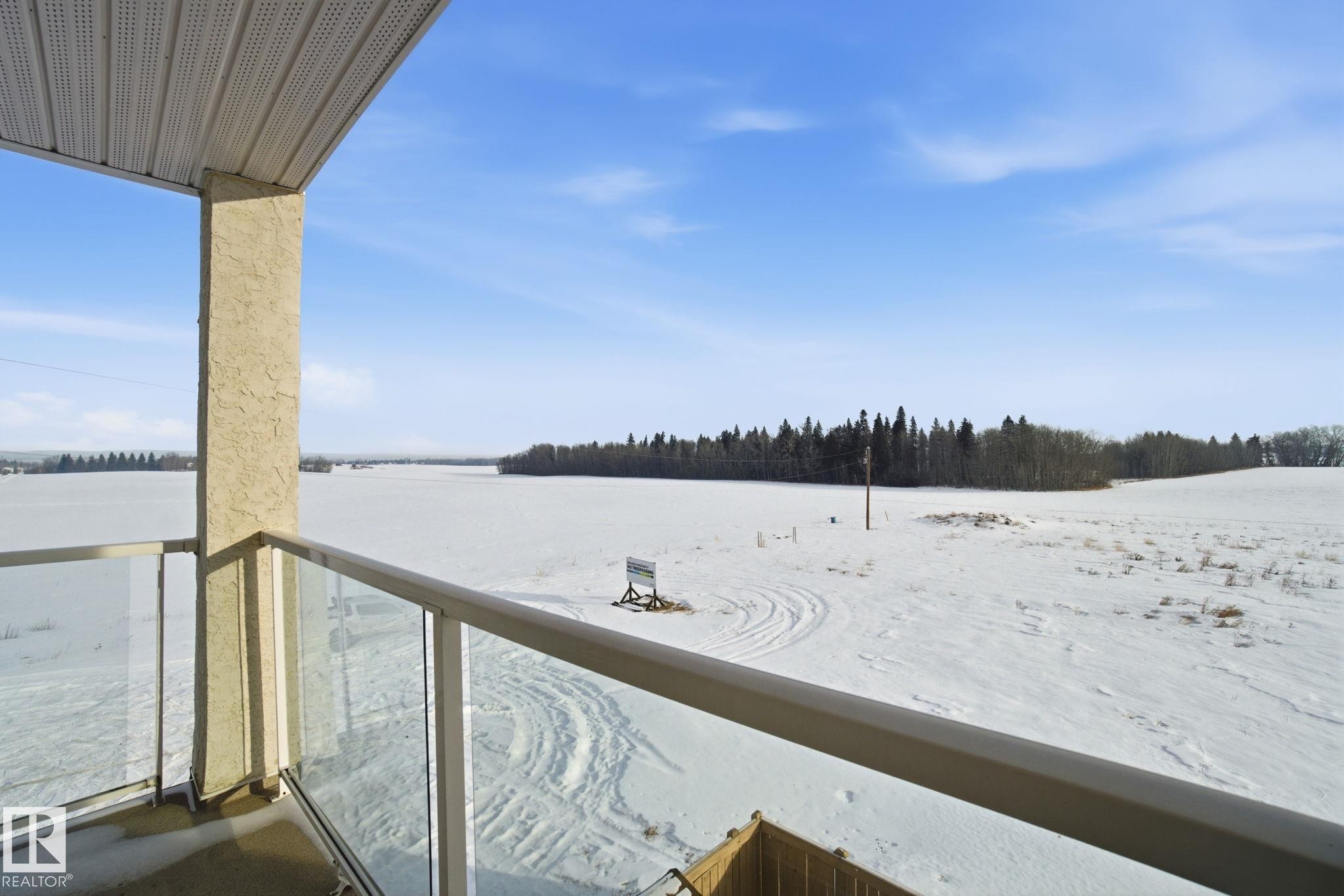 320 7801 Golf Course Road, Stony Plain, AB - Outdoor With Body Of Water With Balcony With View