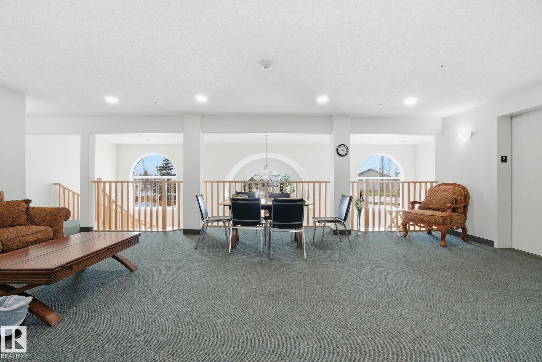 320 7801 Golf Course Road, Stony Plain, AB - Indoor Photo Showing Living Room