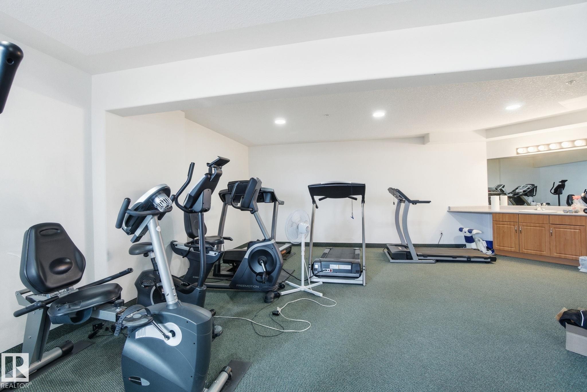 320 7801 Golf Course Road, Stony Plain, AB - Indoor Photo Showing Gym Room