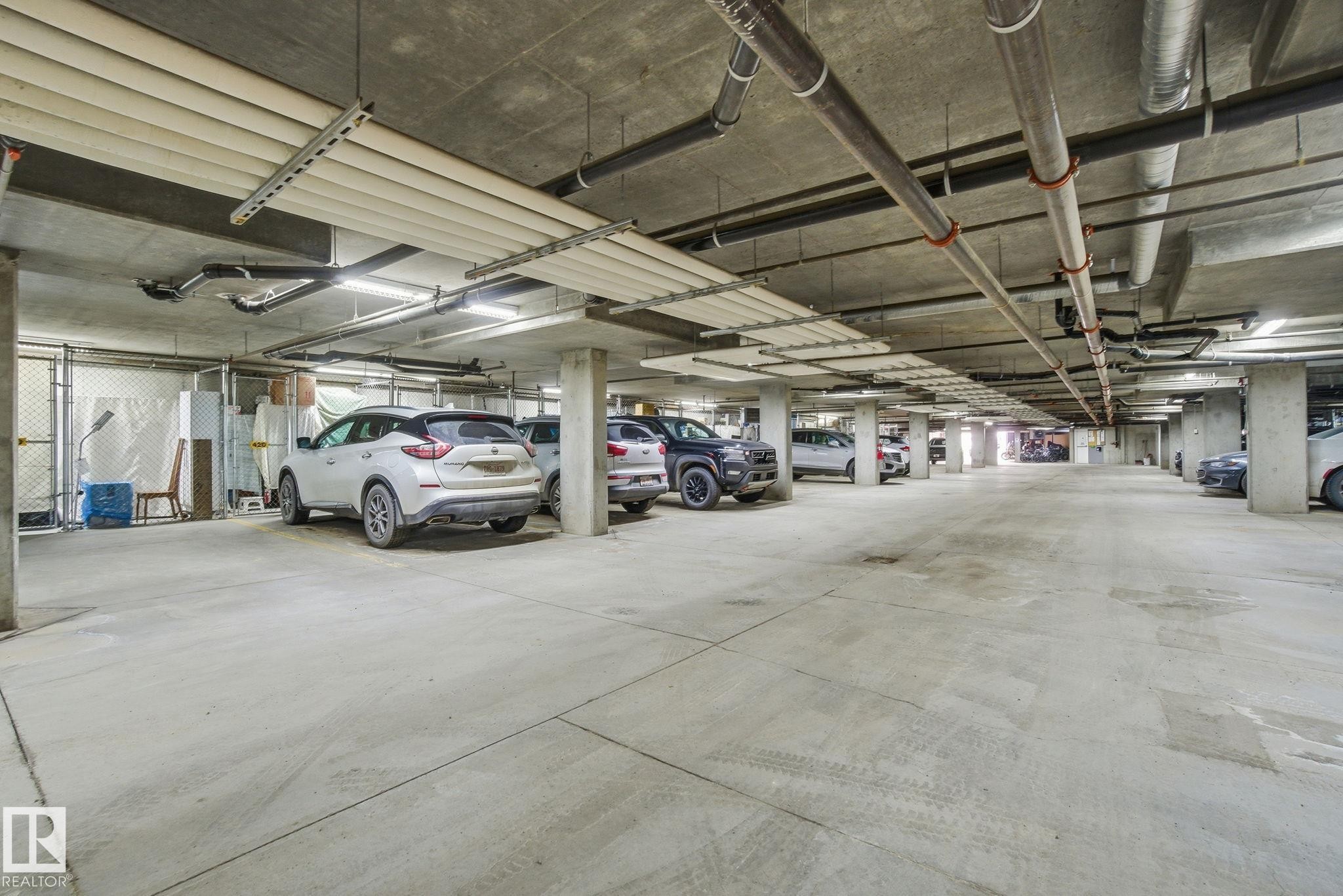 320 7801 Golf Course Road, Stony Plain, AB - Indoor Photo Showing Garage