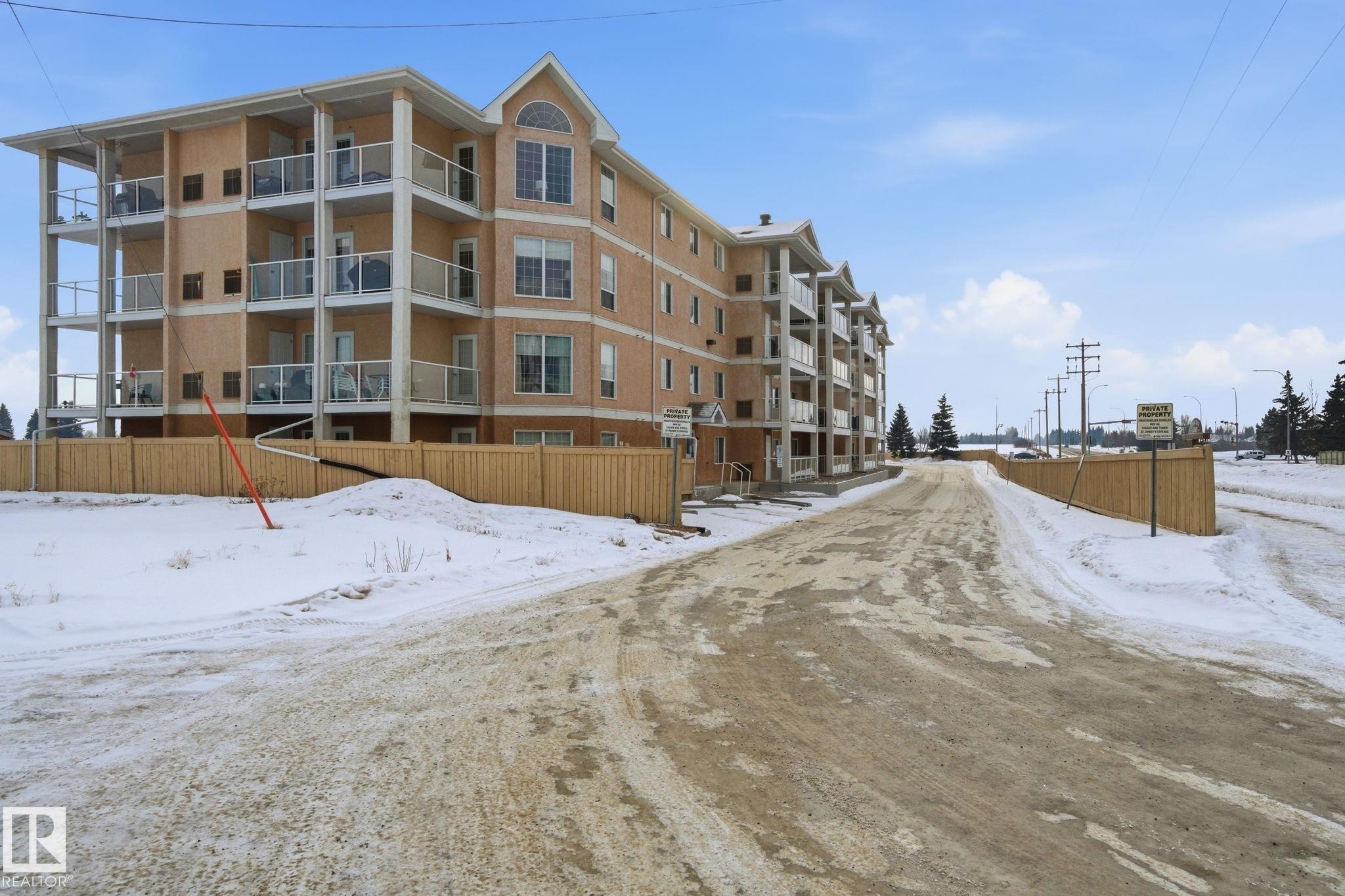 320 7801 Golf Course Road, Stony Plain, AB - Outdoor With Balcony With Facade