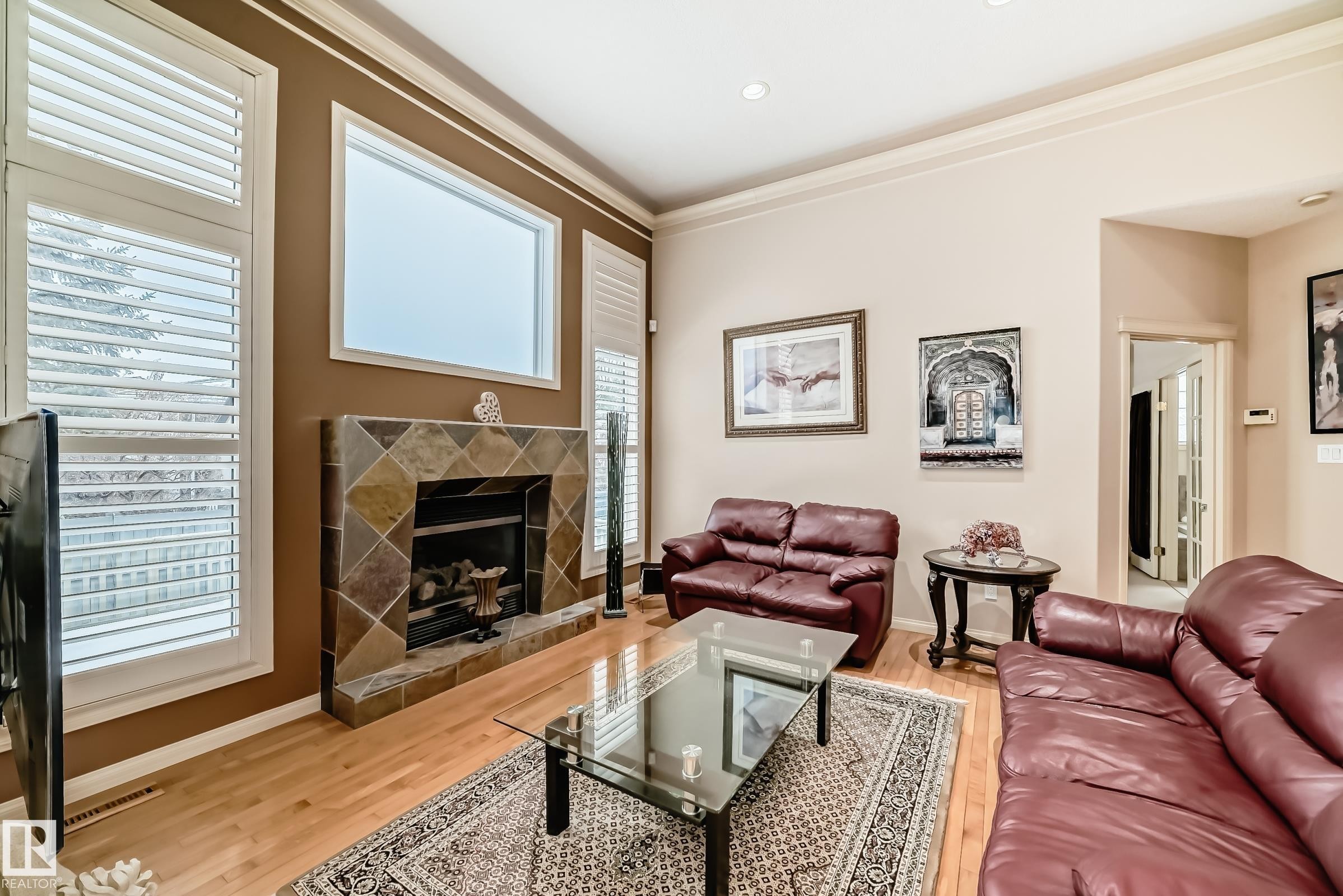 Living room with lots of natural light. - 241 Darlington Crescent, Edmonton, AB - Indoor Photo Showing Living Room With Fireplace