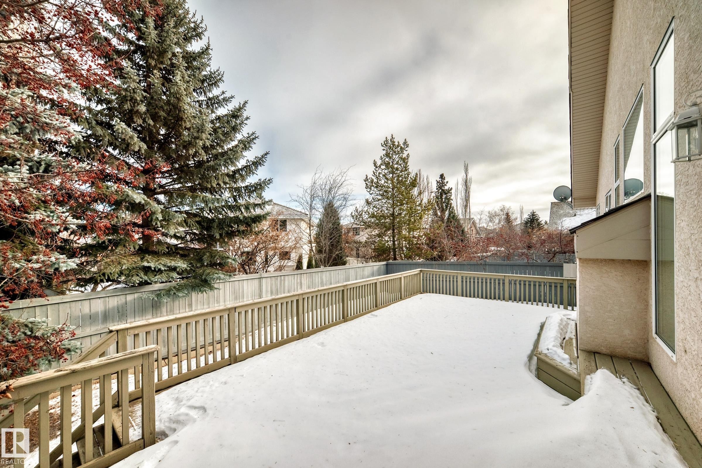 Fenced backyard featuring a deck - 241 Darlington Crescent, Edmonton, AB - Outdoor With Exterior