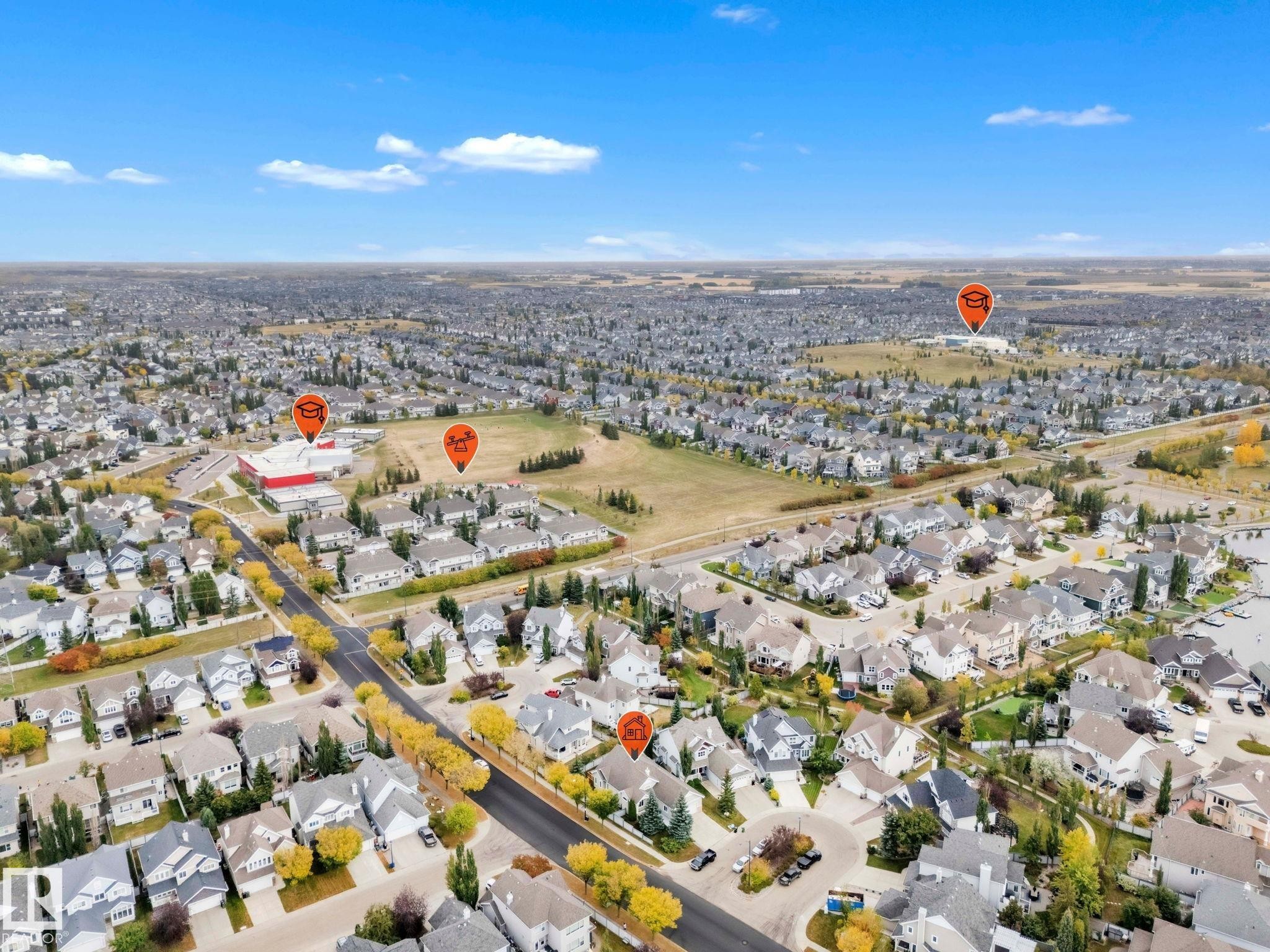 Aerial view of property and surrounding area featuring nearby suburban area - 1217 Summerside Drive, Edmonton, AB - Outdoor With View