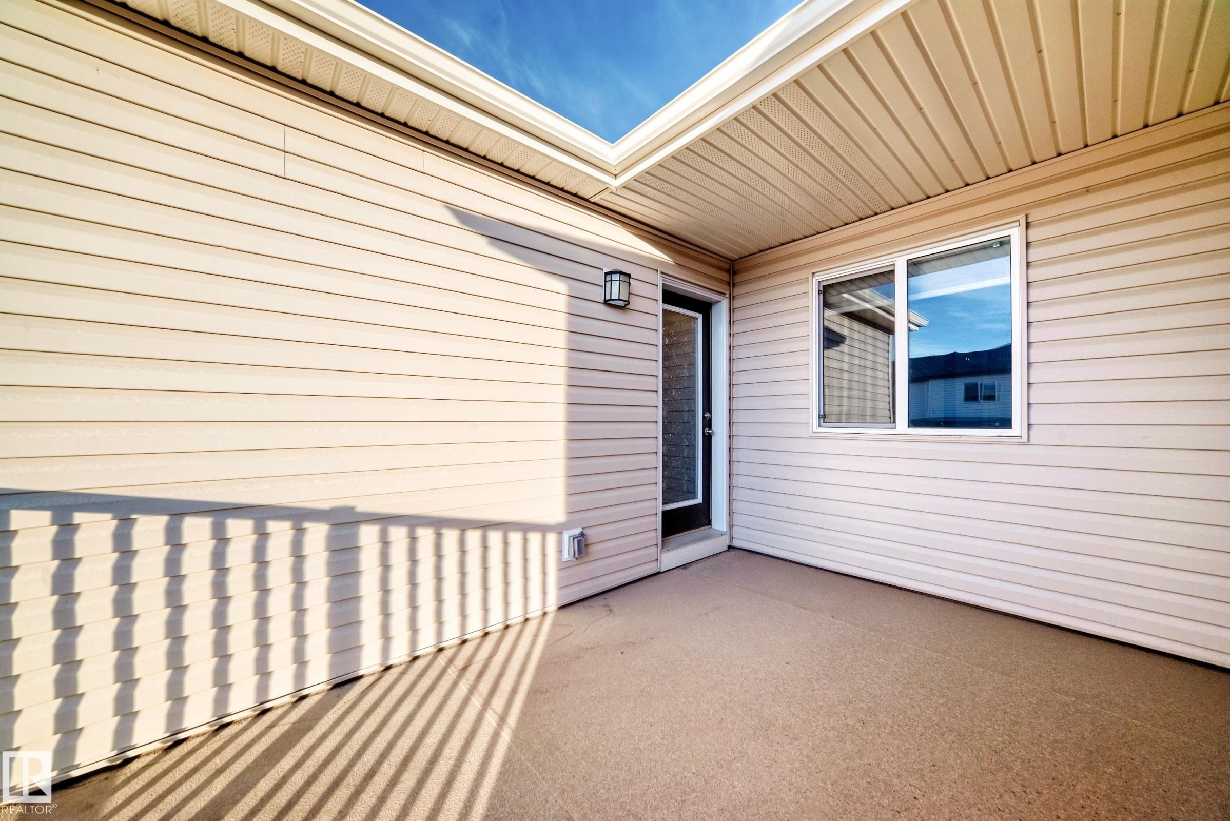 View of patio - 1002 Stillwater Boulevard, Edmonton, AB - Outdoor With Exterior