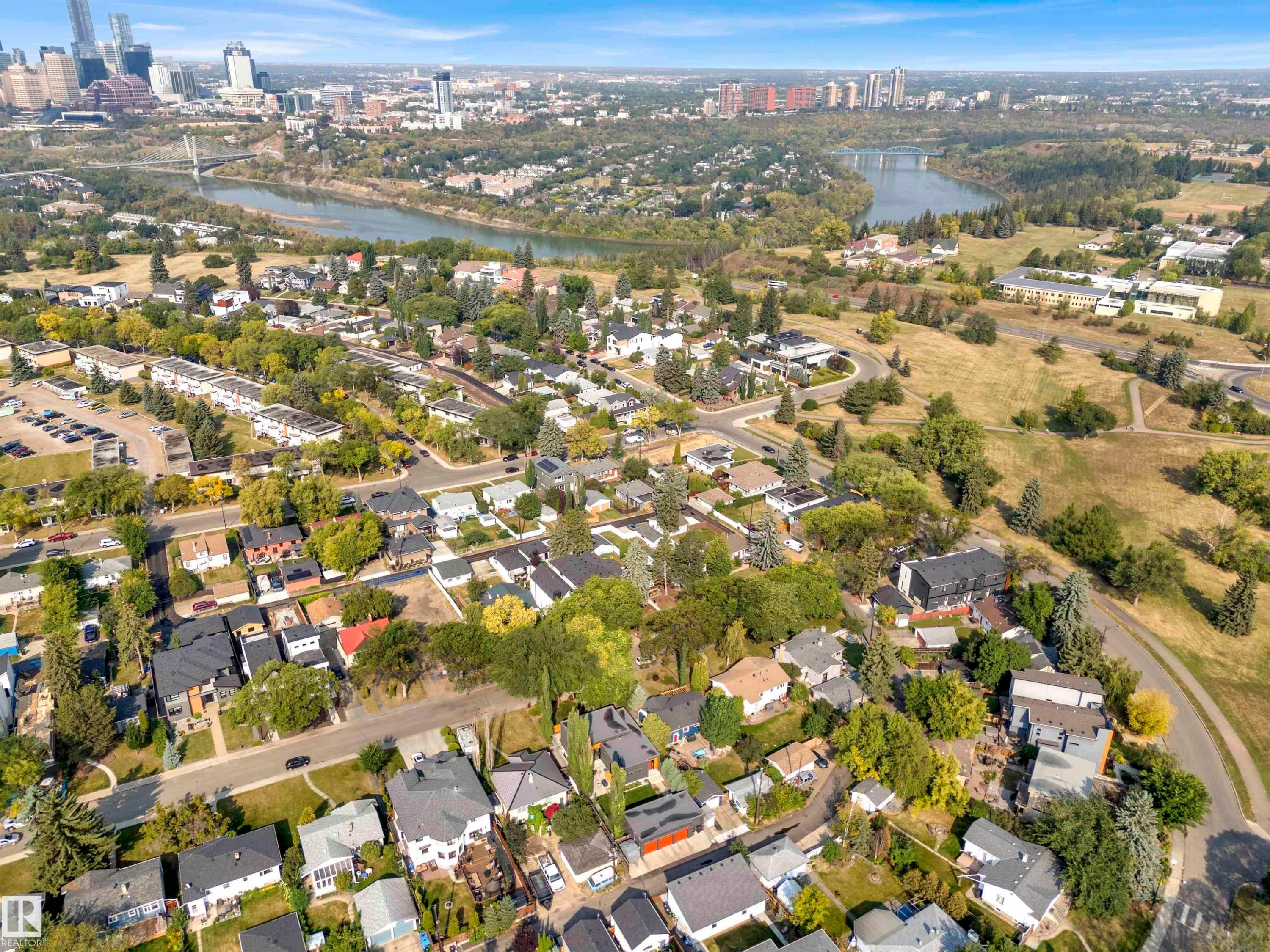 Aerial view of property and surrounding area featuring a large body of water and nearby suburban area - 9559 85 Street, Edmonton, AB - Outdoor With View