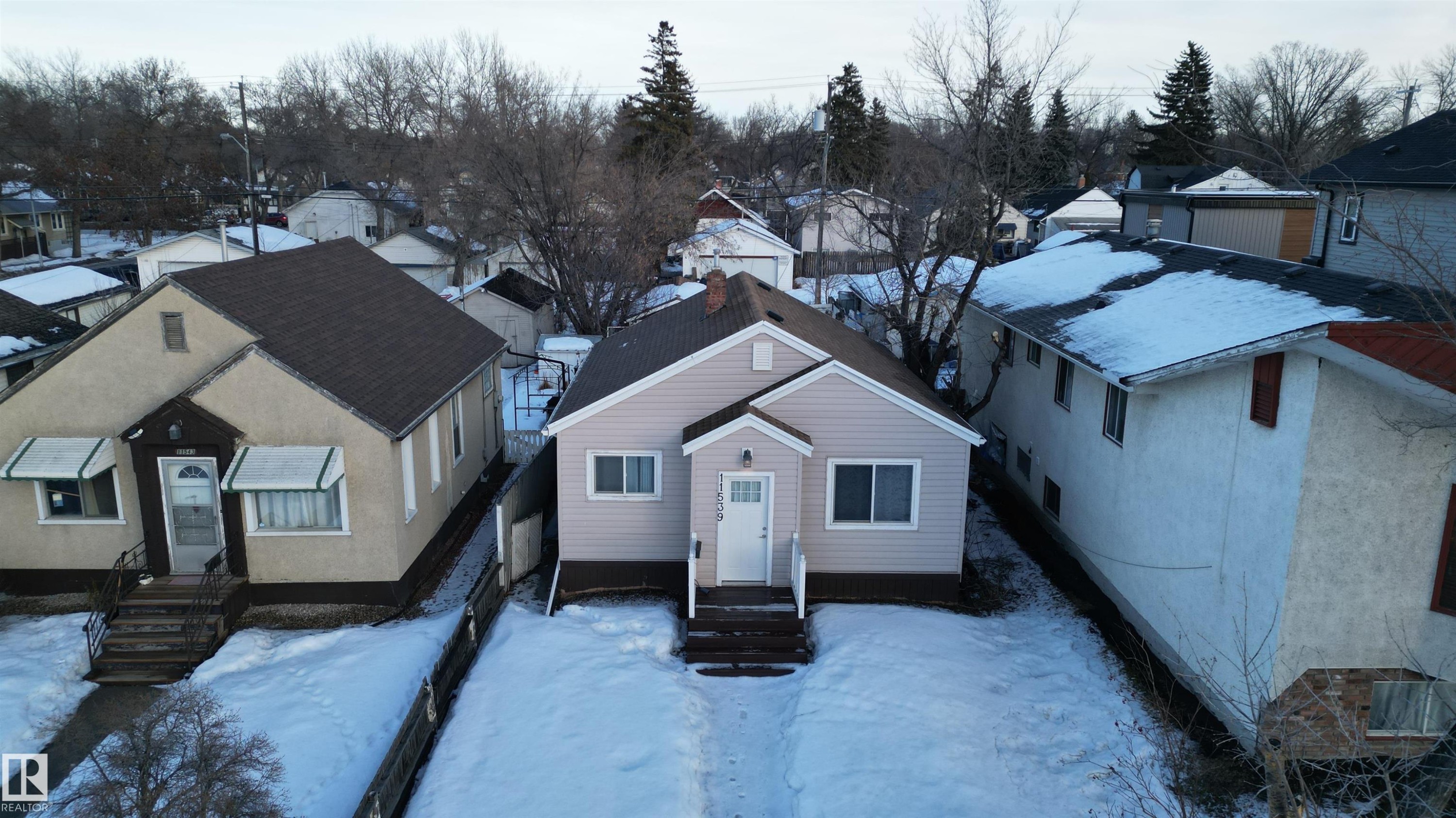 View of front of house featuring a residential view and entry steps - 11539 101 Street, Edmonton, AB - Outdoor With Facade