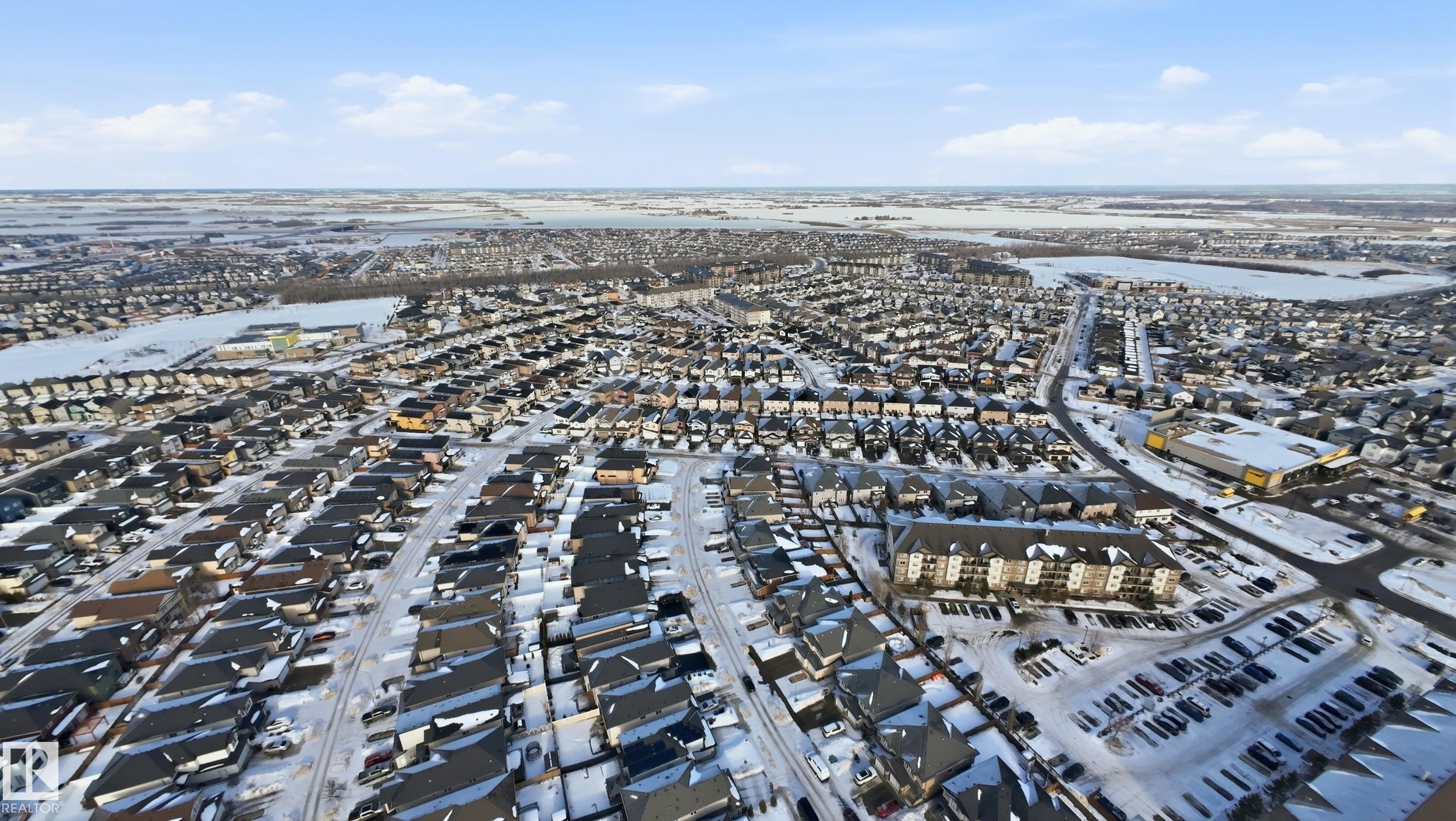 Aerial view of property and surrounding area with nearby suburban area - 5978 167C Avenue, Edmonton, AB - Outdoor With View