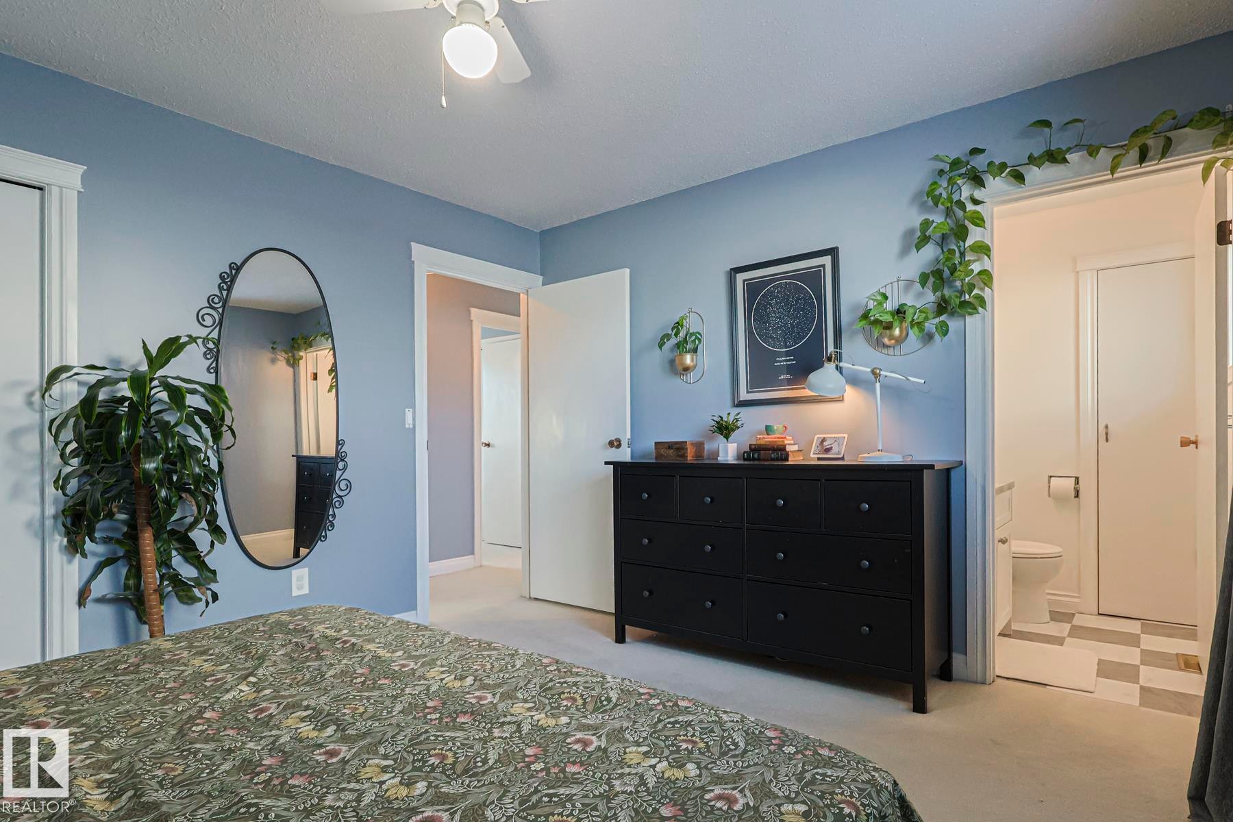 Bedroom with light carpet and ceiling fan - 192 Dunluce Road, Edmonton, AB - Indoor Photo Showing Bedroom
