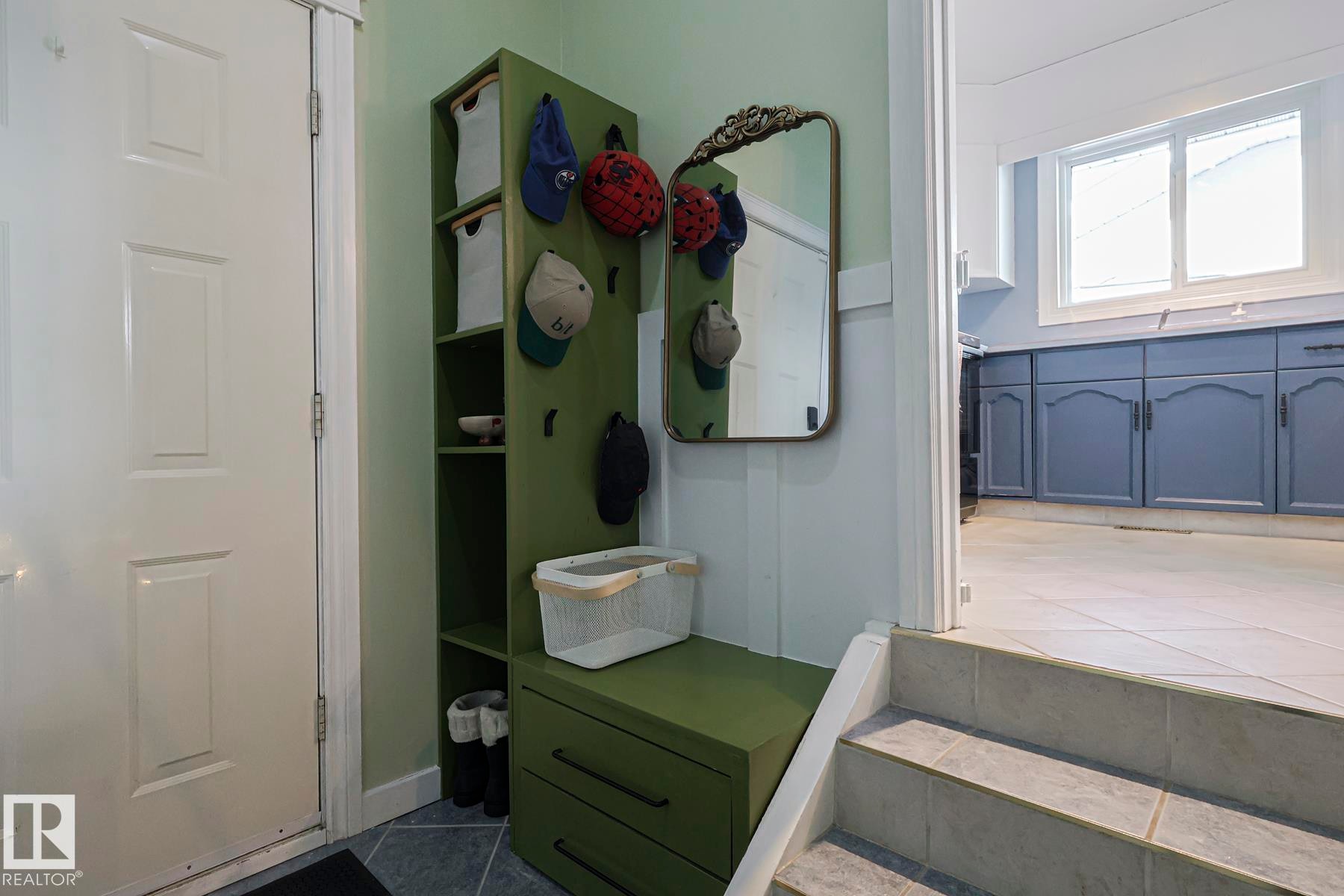 Mudroom featuring dark tile patterned flooring - 192 Dunluce Road, Edmonton, AB - Indoor
