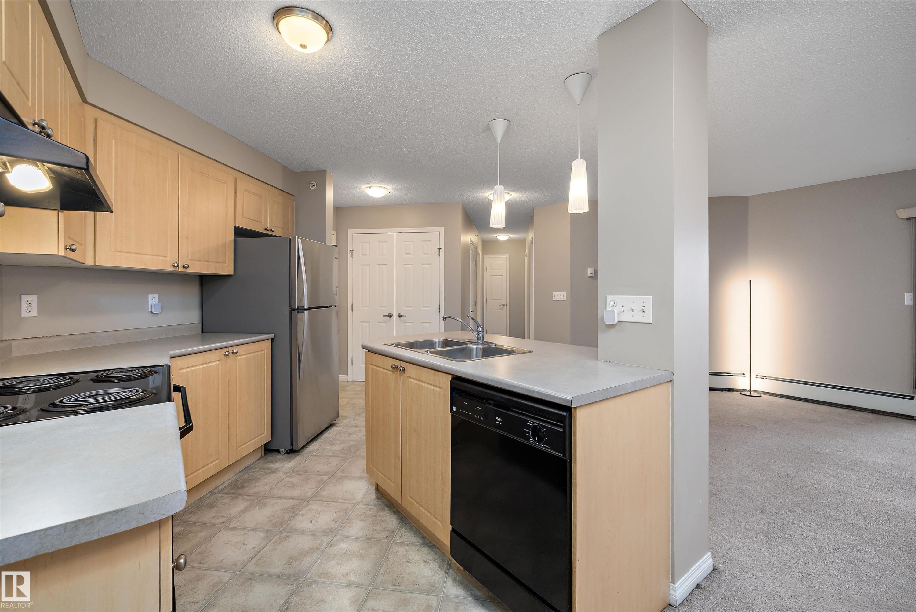 403 622 Mcallister Loop, Edmonton, AB - Indoor Photo Showing Kitchen With Double Sink