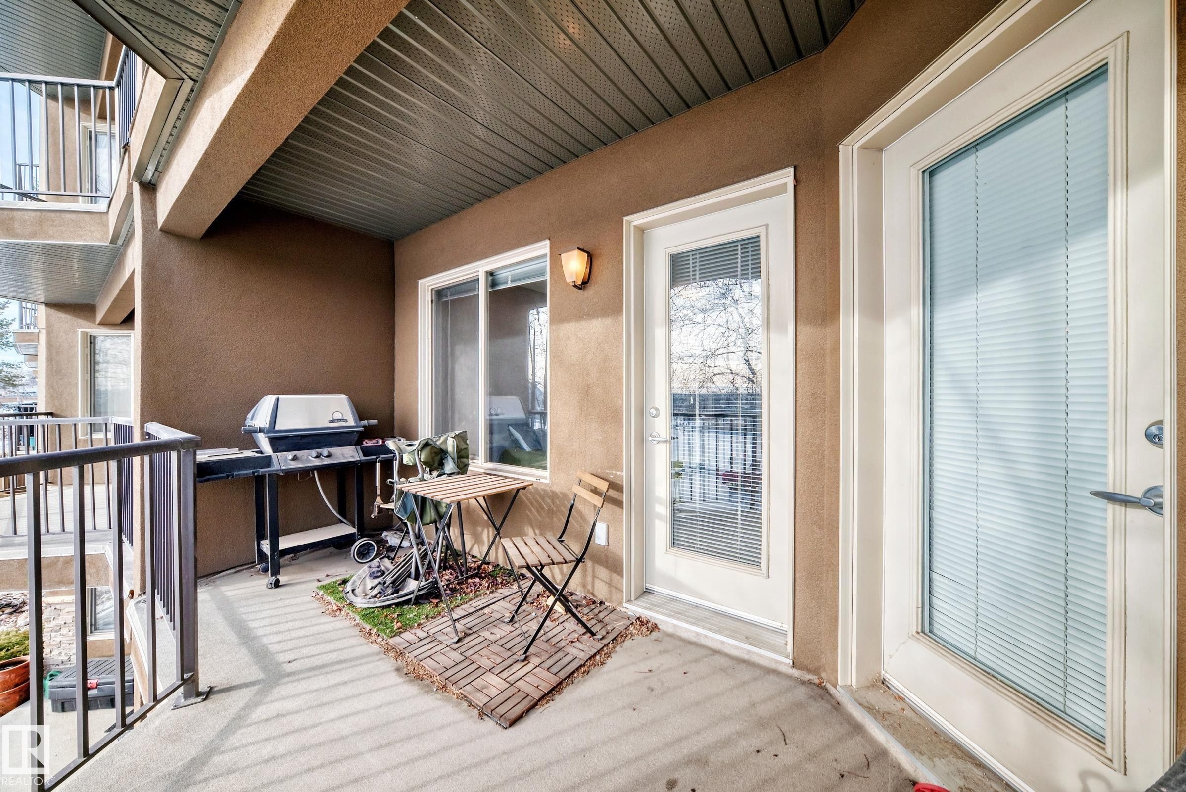 Balcony featuring area for grilling - 232 530 Hooke Road, Edmonton, AB - Outdoor With Deck Patio Veranda With Exterior
