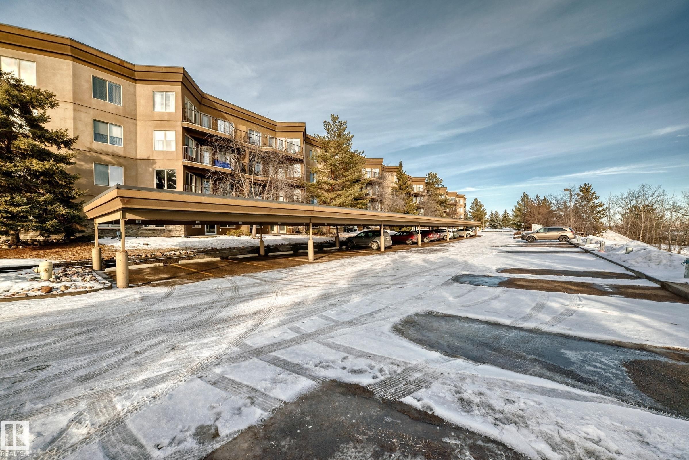 View of community featuring covered parking - 232 530 Hooke Road, Edmonton, AB - Outdoor With Balcony