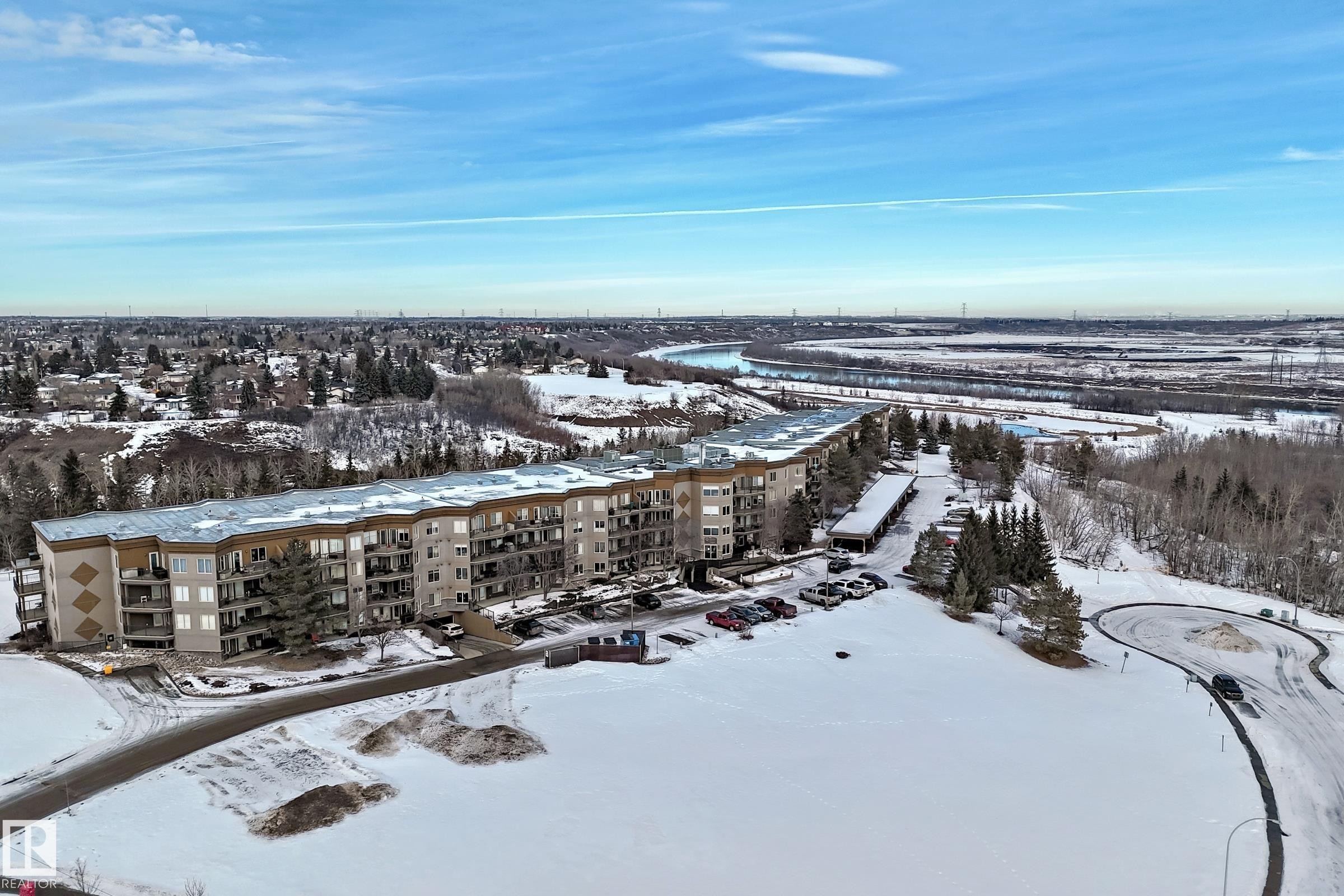 Snowy aerial view featuring a view of apartment building / complex - 232 530 Hooke Road, Edmonton, AB - Outdoor With View