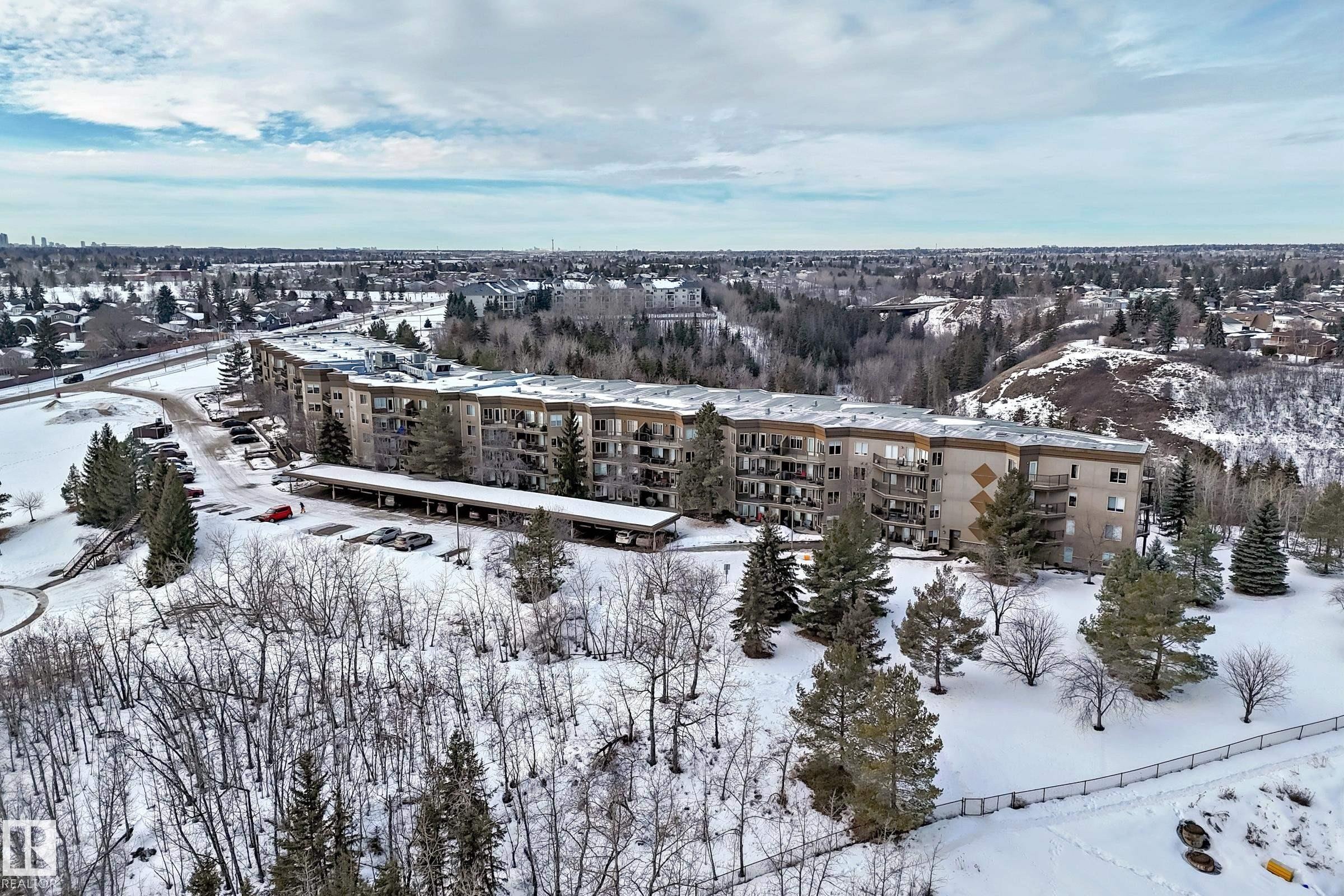 Snowy aerial view featuring a view of apartment building / complex - 232 530 Hooke Road, Edmonton, AB - Outdoor With View