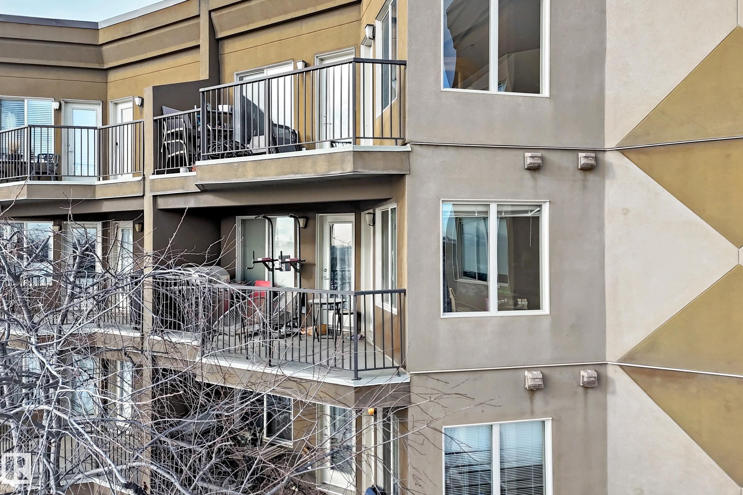 View of building exterior - 232 530 Hooke Road, Edmonton, AB - Outdoor With Balcony