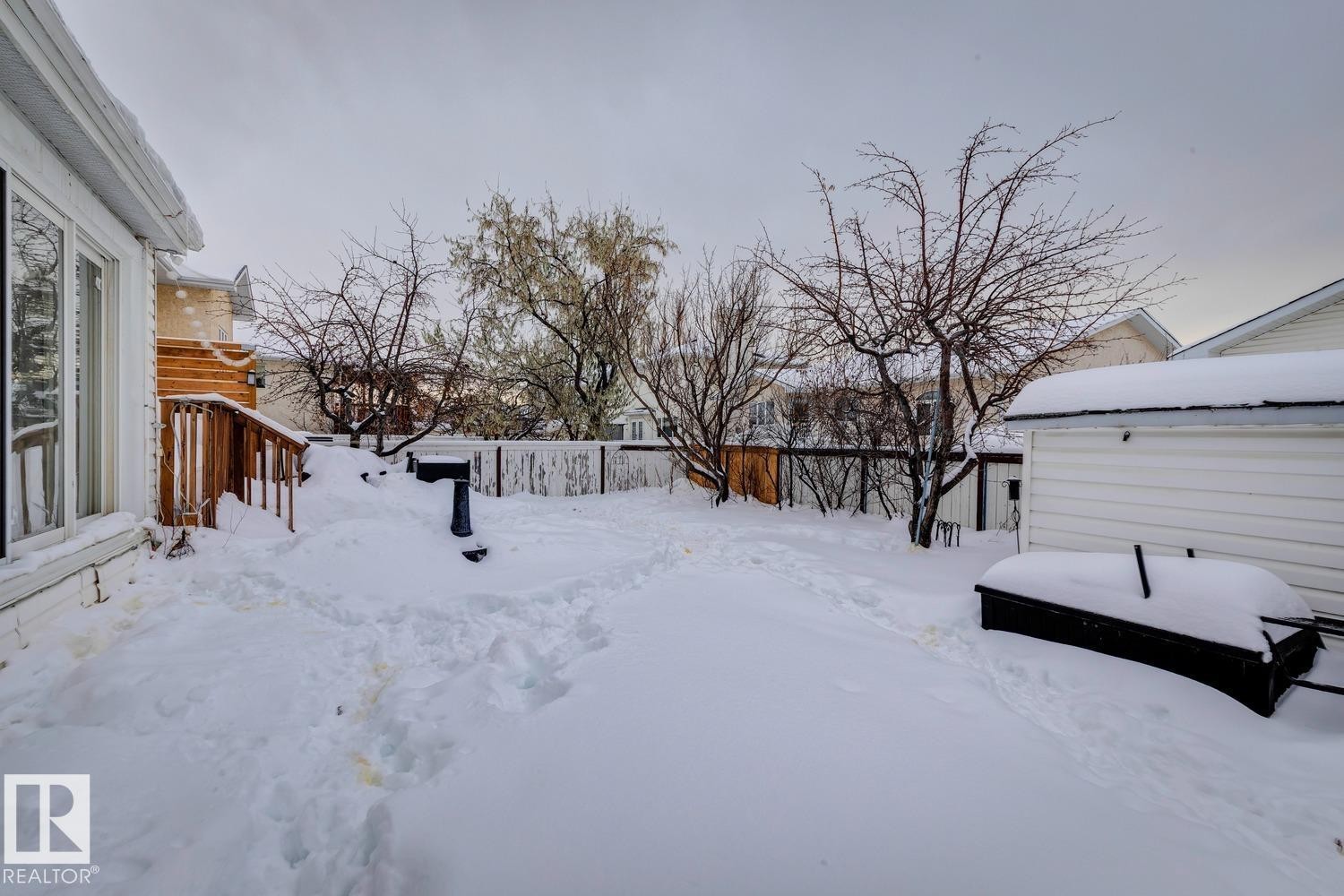 View of yard covered in snow - 8617 158A Avenue, Edmonton, AB - Outdoor