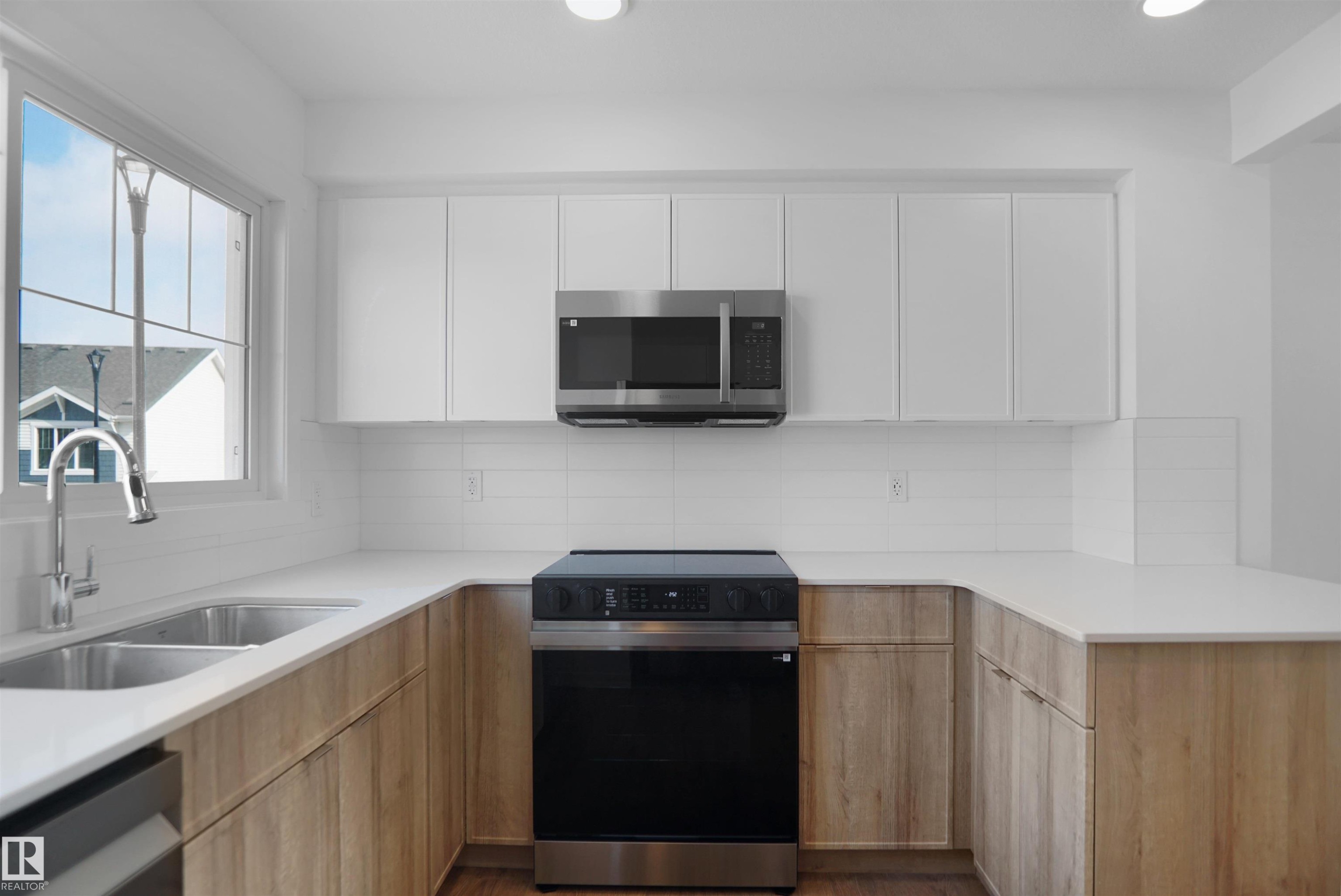 27 531 Merlin Landing, Edmonton, AB - Indoor Photo Showing Kitchen With Double Sink