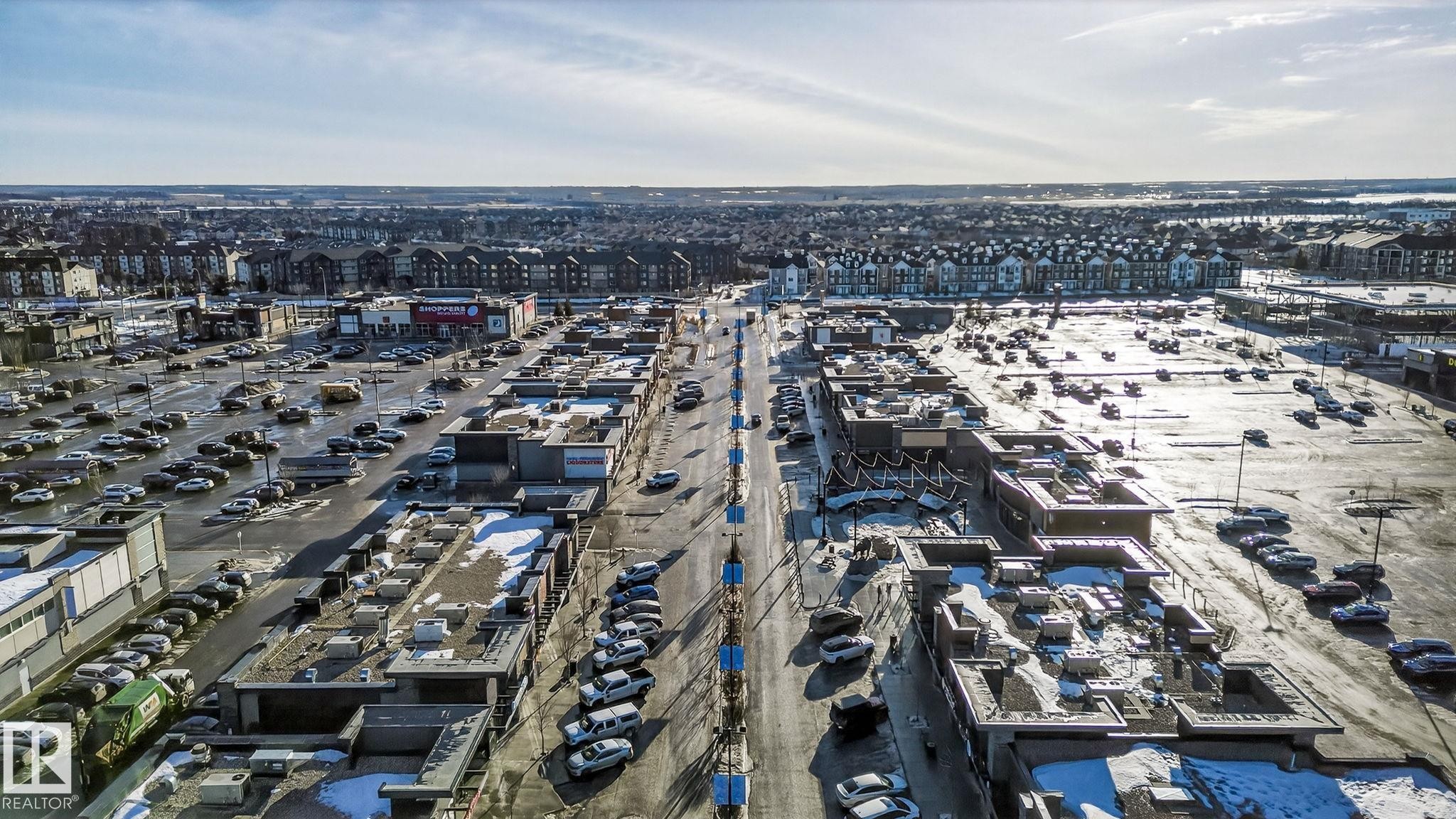 Aerial overview of property's location featuring nearby urban area - 2338 Casselman Crescent, Edmonton, AB - Outdoor With View
