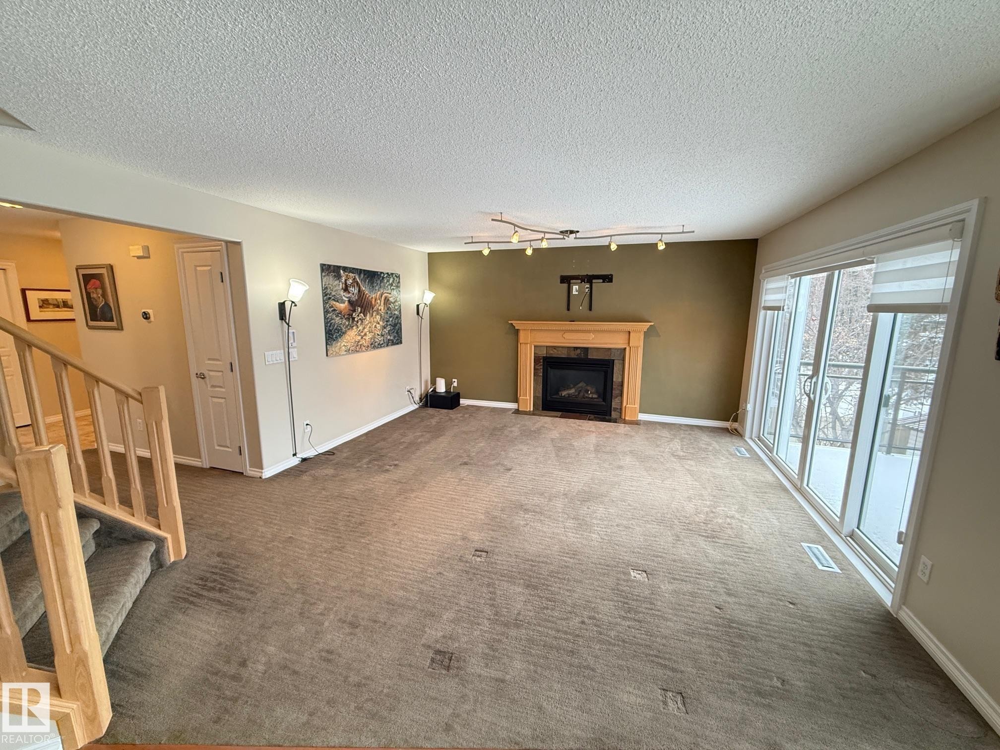 223 Ormsby Road East, Edmonton, AB - Indoor Photo Showing Other Room With Fireplace