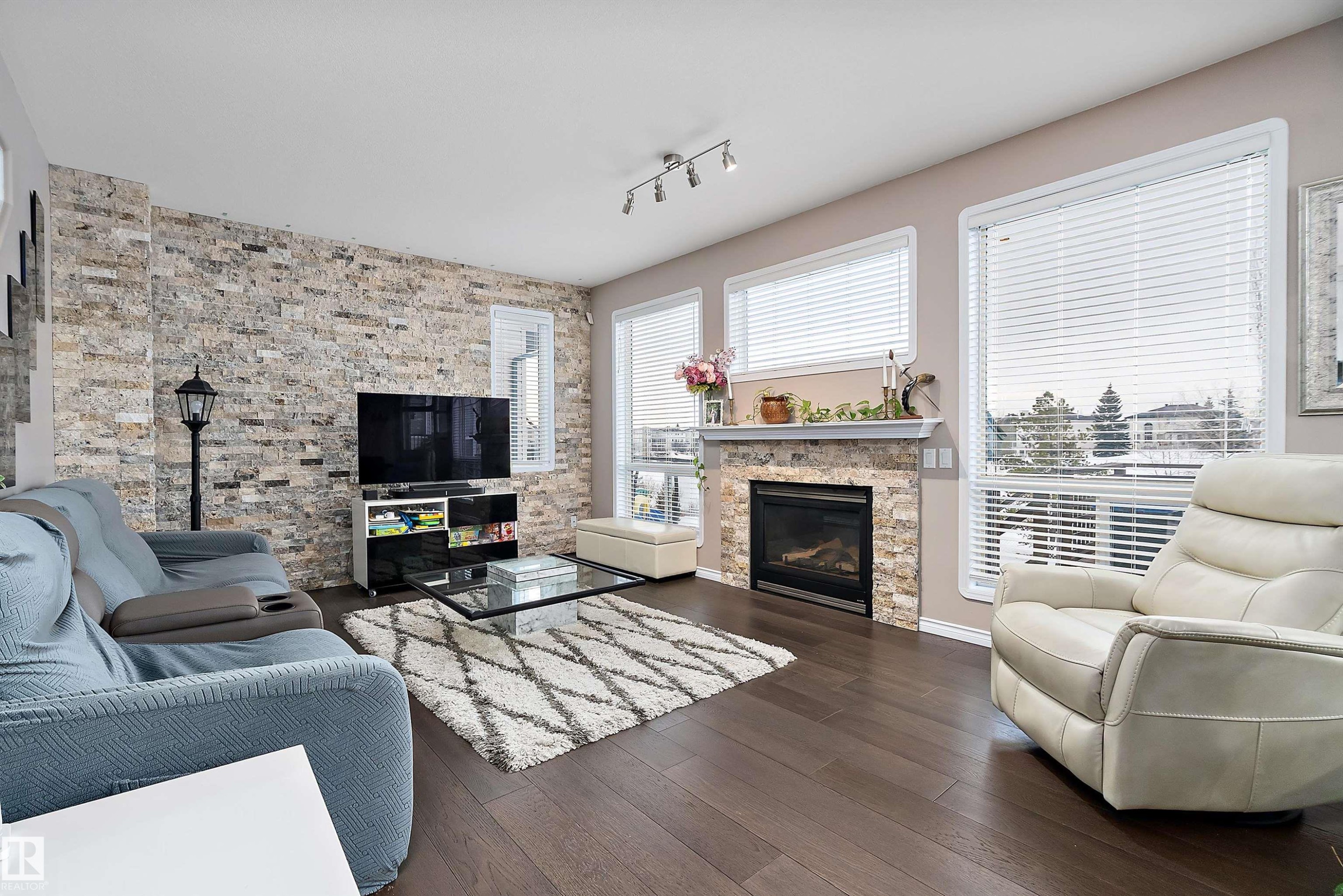 1105 Klarvatten Cove, Edmonton, AB - Indoor Photo Showing Living Room With Fireplace