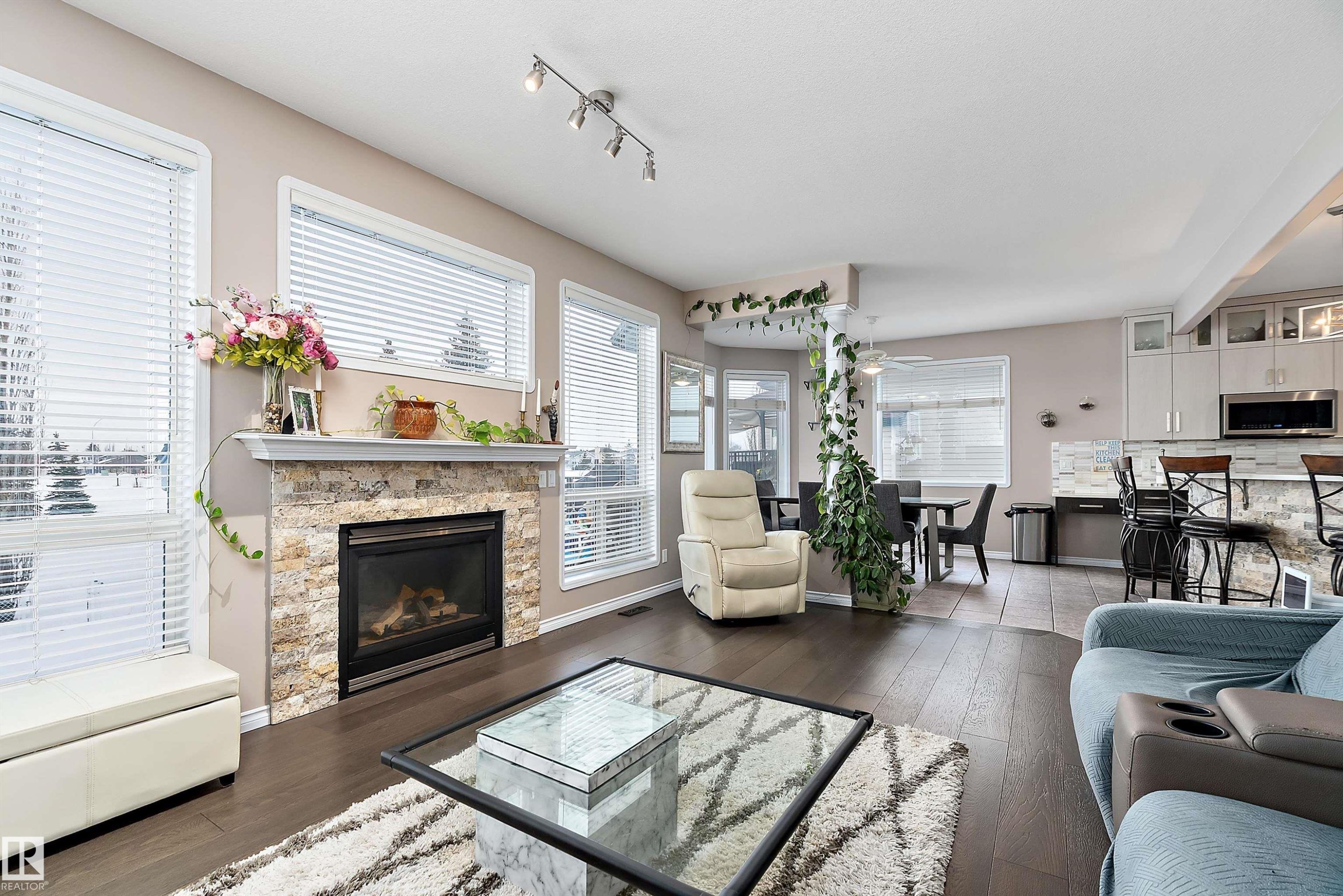 1105 Klarvatten Cove, Edmonton, AB - Indoor Photo Showing Living Room With Fireplace