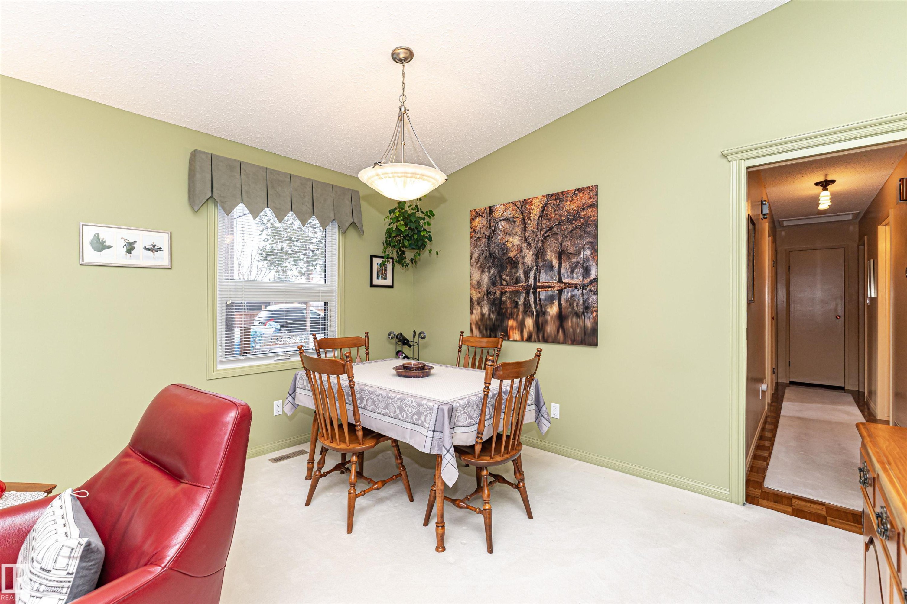 Dining room with baseboards and carpet flooring - 2112 67 Street Nw, Edmonton, AB - Indoor Photo Showing Dining Room