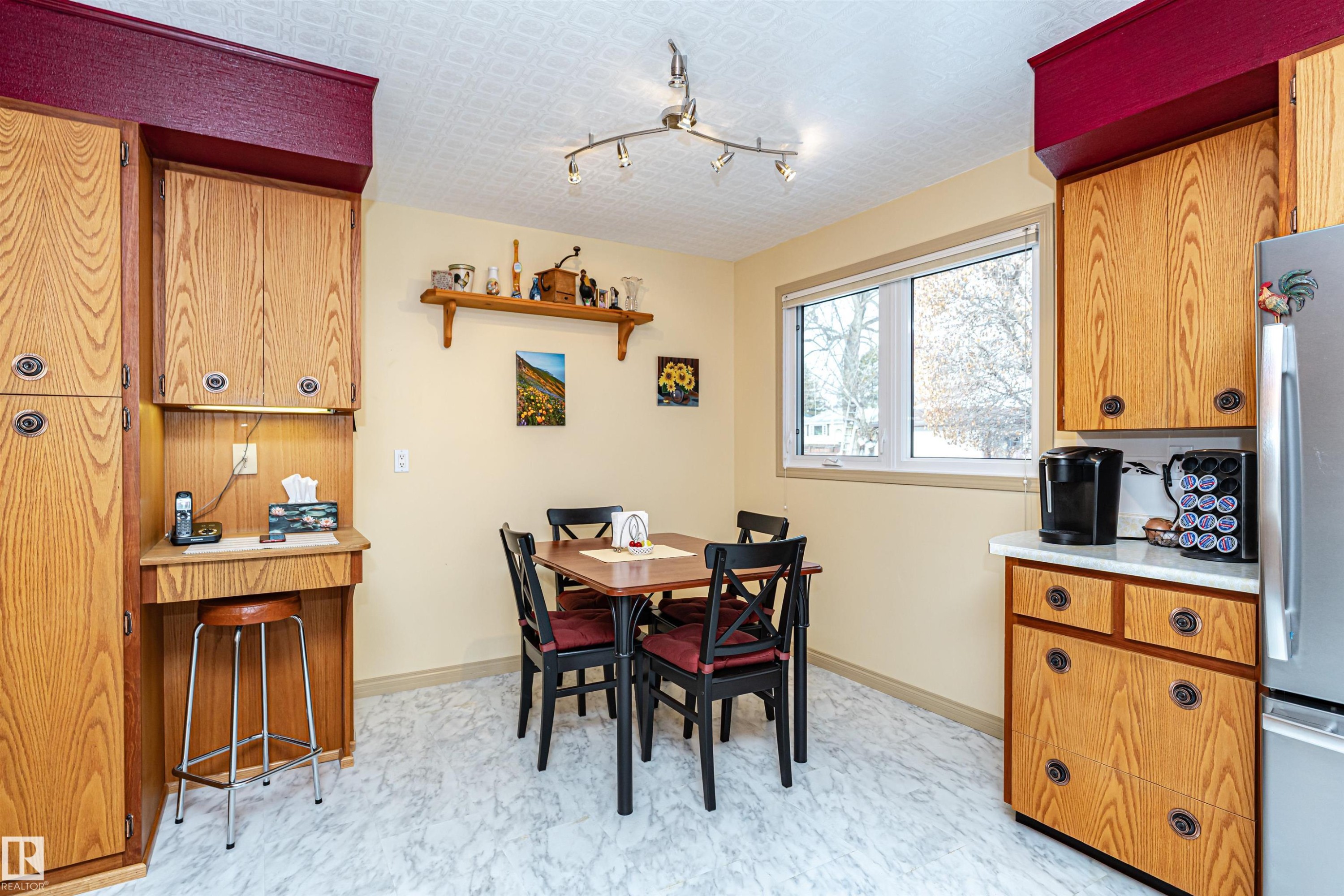 Dining room with rail lighting and light floors - 2112 67 Street Nw, Edmonton, AB - Indoor