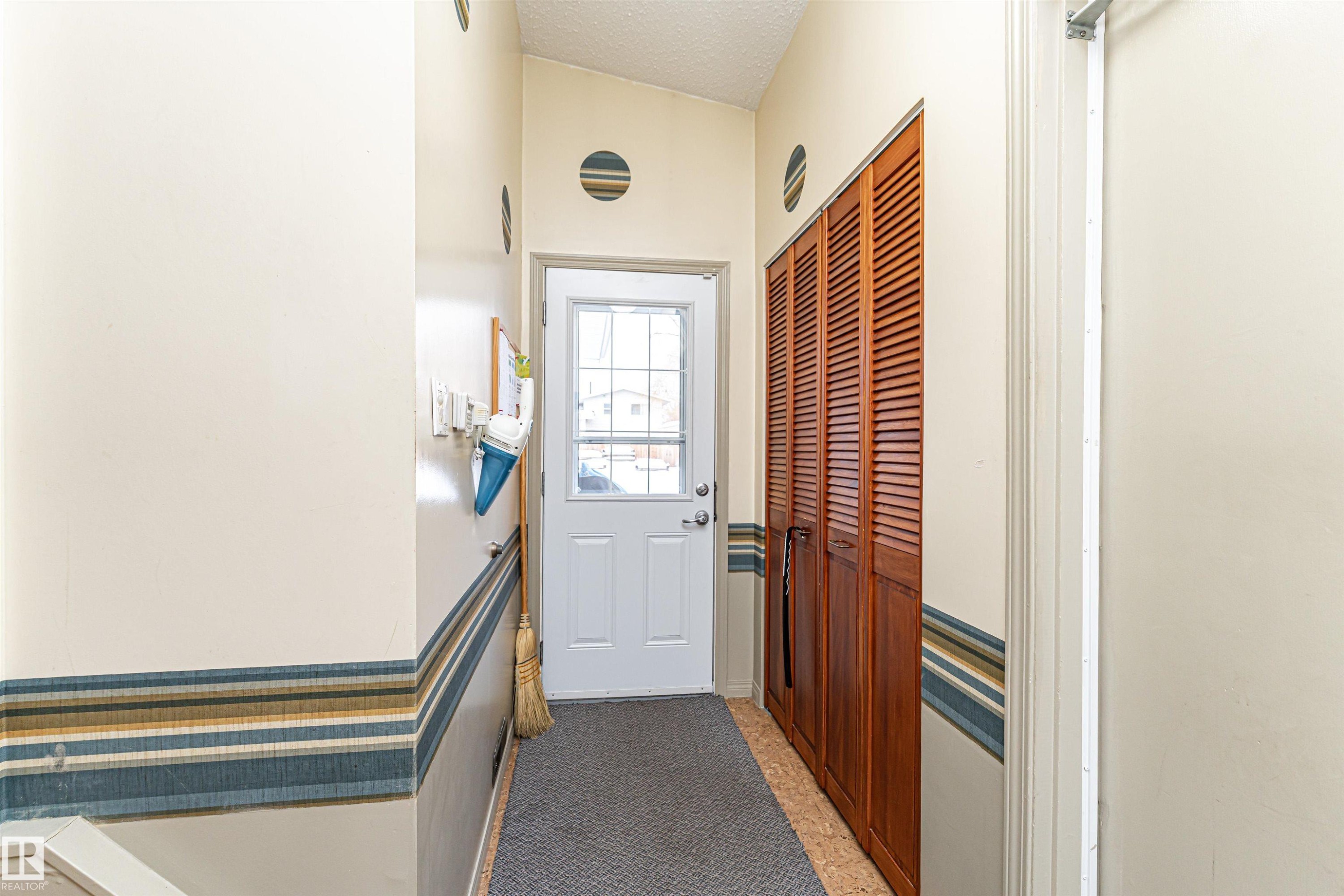 View of side doorway - 2112 67 Street Nw, Edmonton, AB - Indoor Photo Showing Other Room