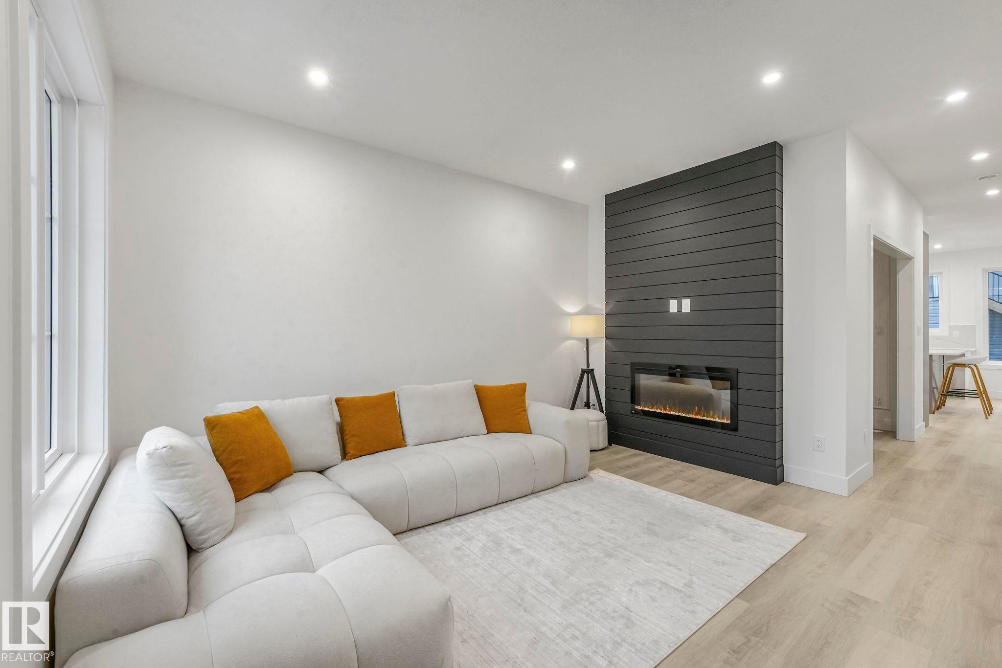 3518 42 Ave, Beaumont, AB - Indoor Photo Showing Living Room With Fireplace