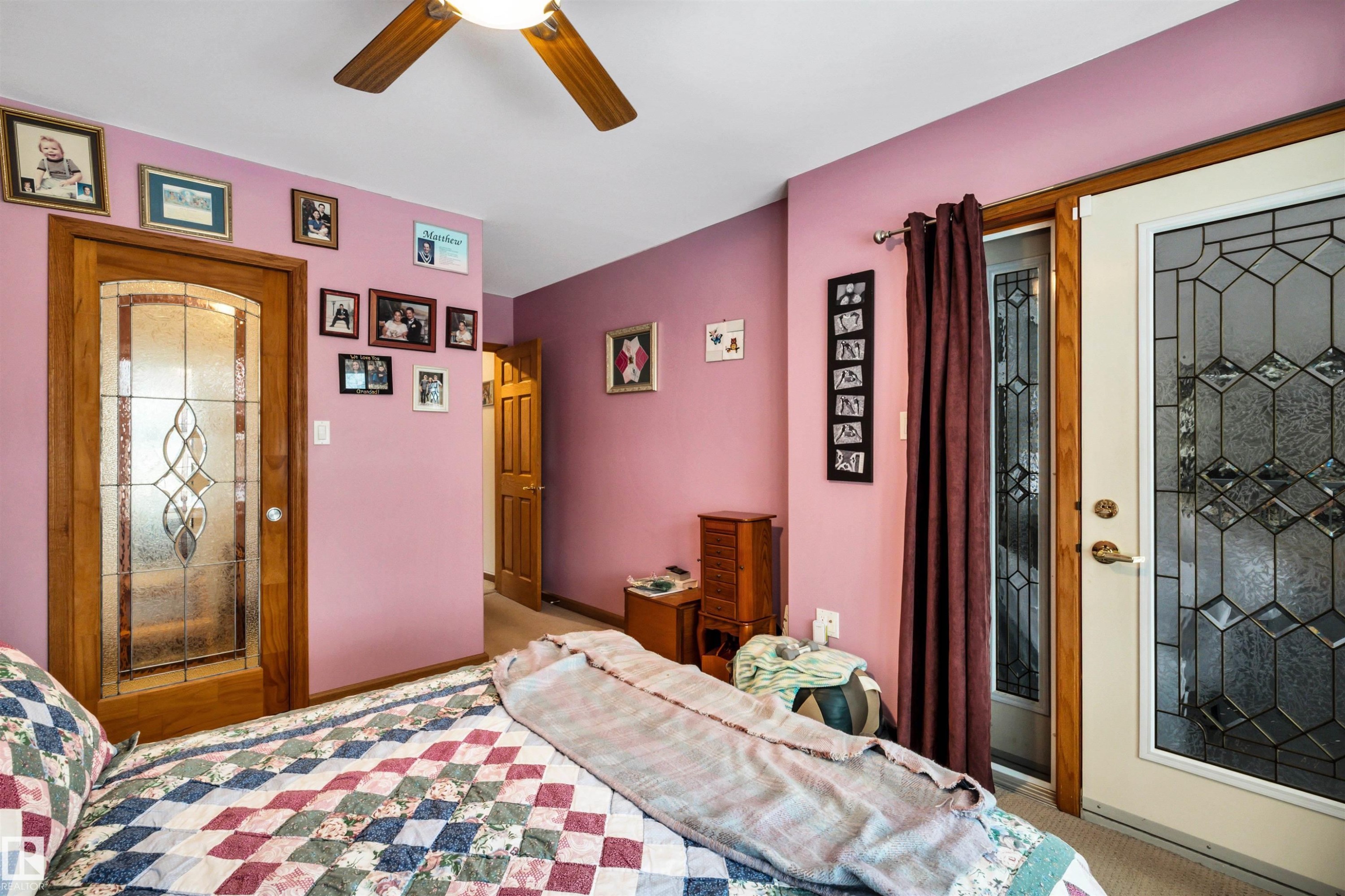Bedroom with a ceiling fan and baseboards - 11432 71 Street, Edmonton, AB - Indoor Photo Showing Bedroom