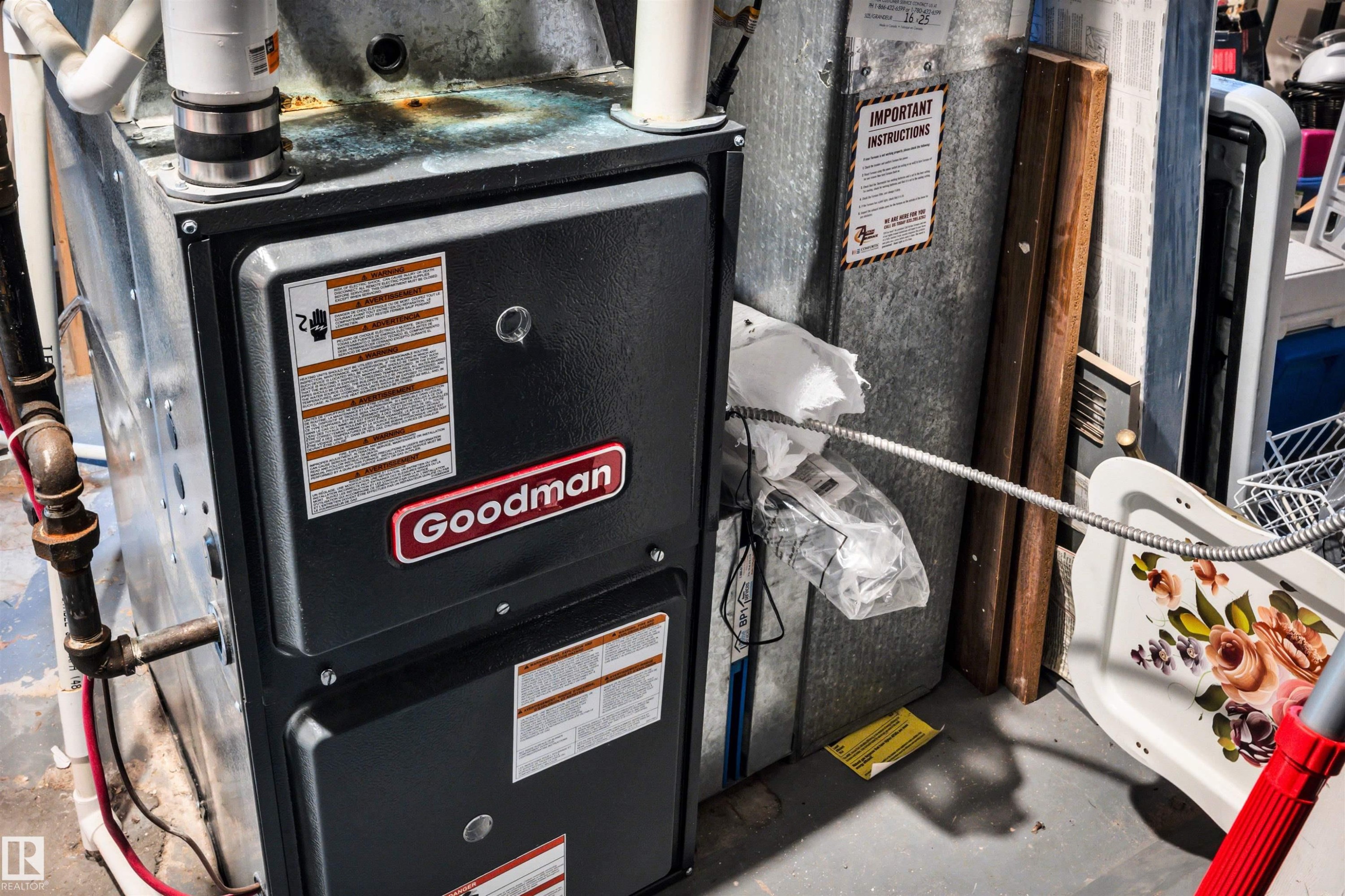 Utility room with heating unit - 11432 71 Street, Edmonton, AB - Indoor Photo Showing Basement