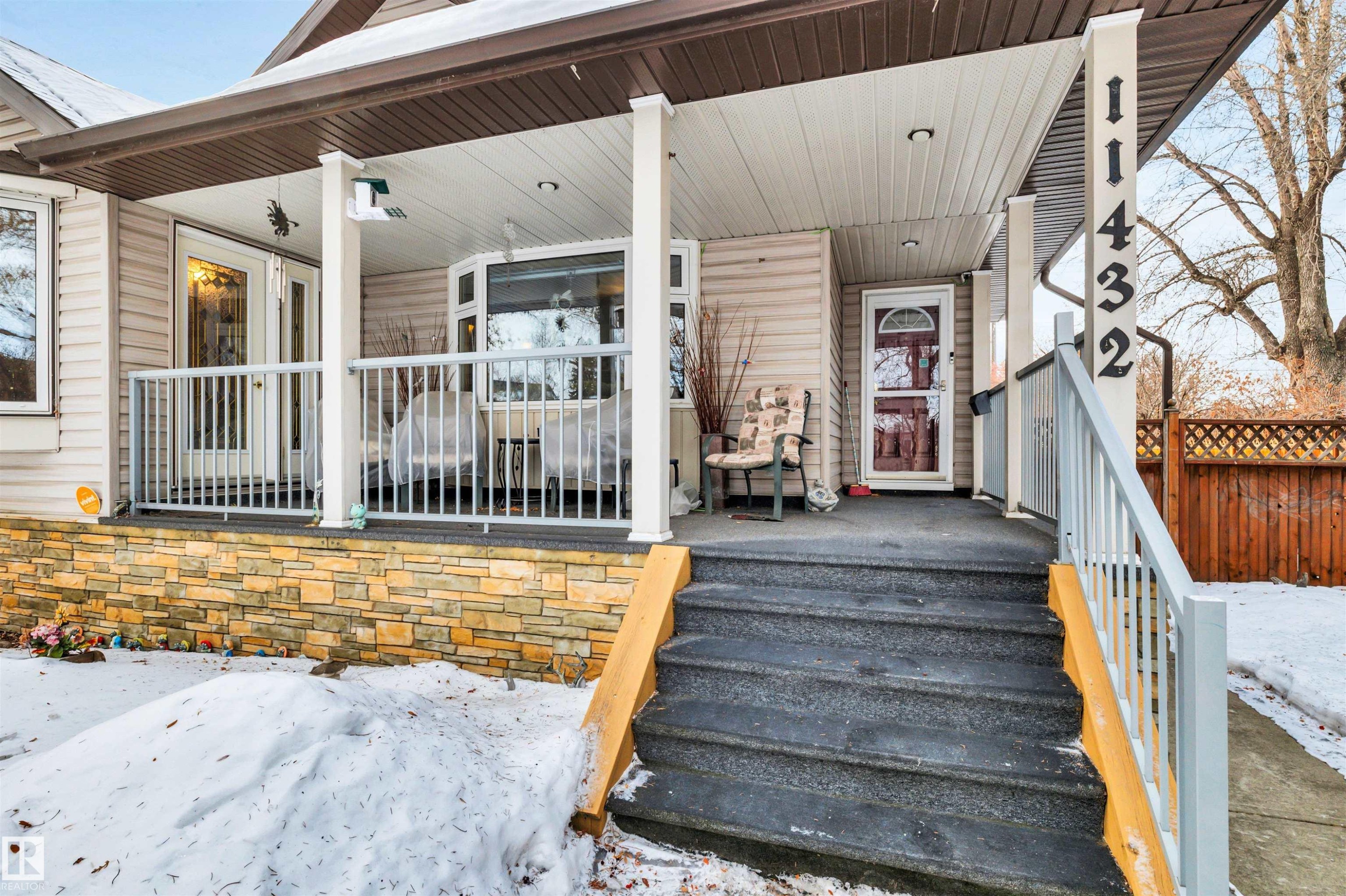 Property entrance with a porch - 11432 71 Street, Edmonton, AB - Outdoor With Deck Patio Veranda