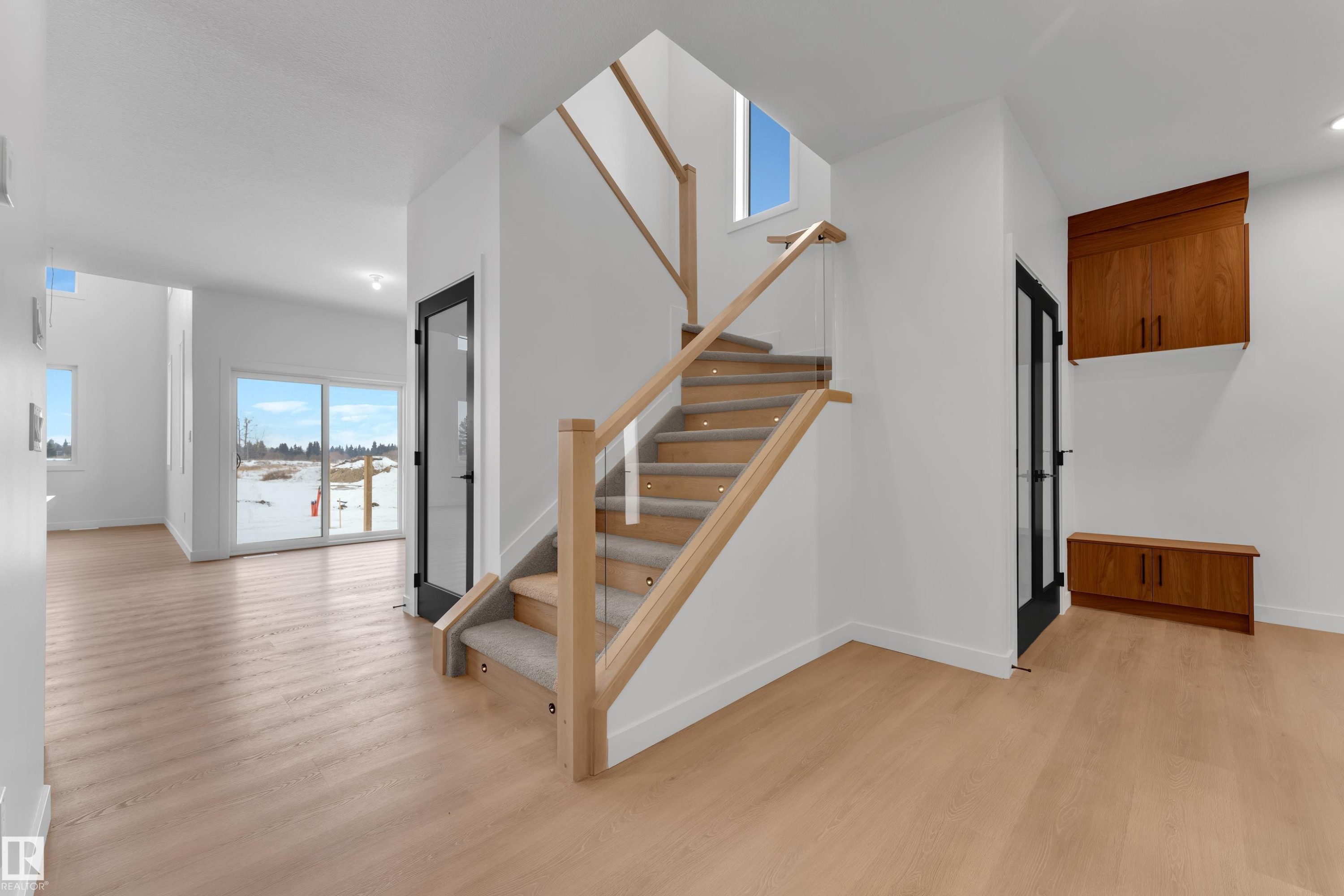 Stairway with wood finished floors - 40 Grayson Green, Stony Plain, AB - Indoor Photo Showing Other Room