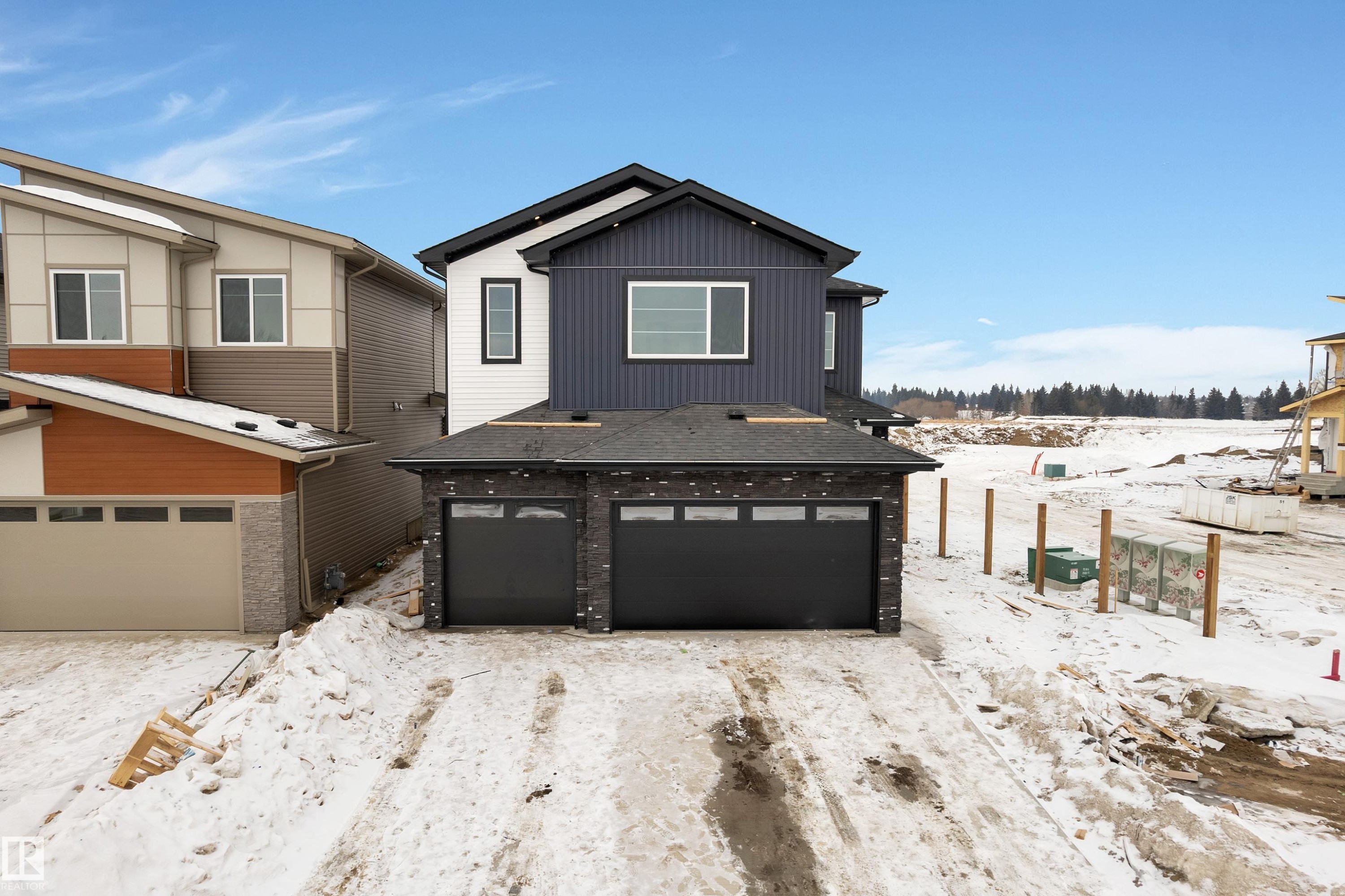 View of front of house featuring an attached garage - 40 Grayson Green, Stony Plain, AB - Outdoor