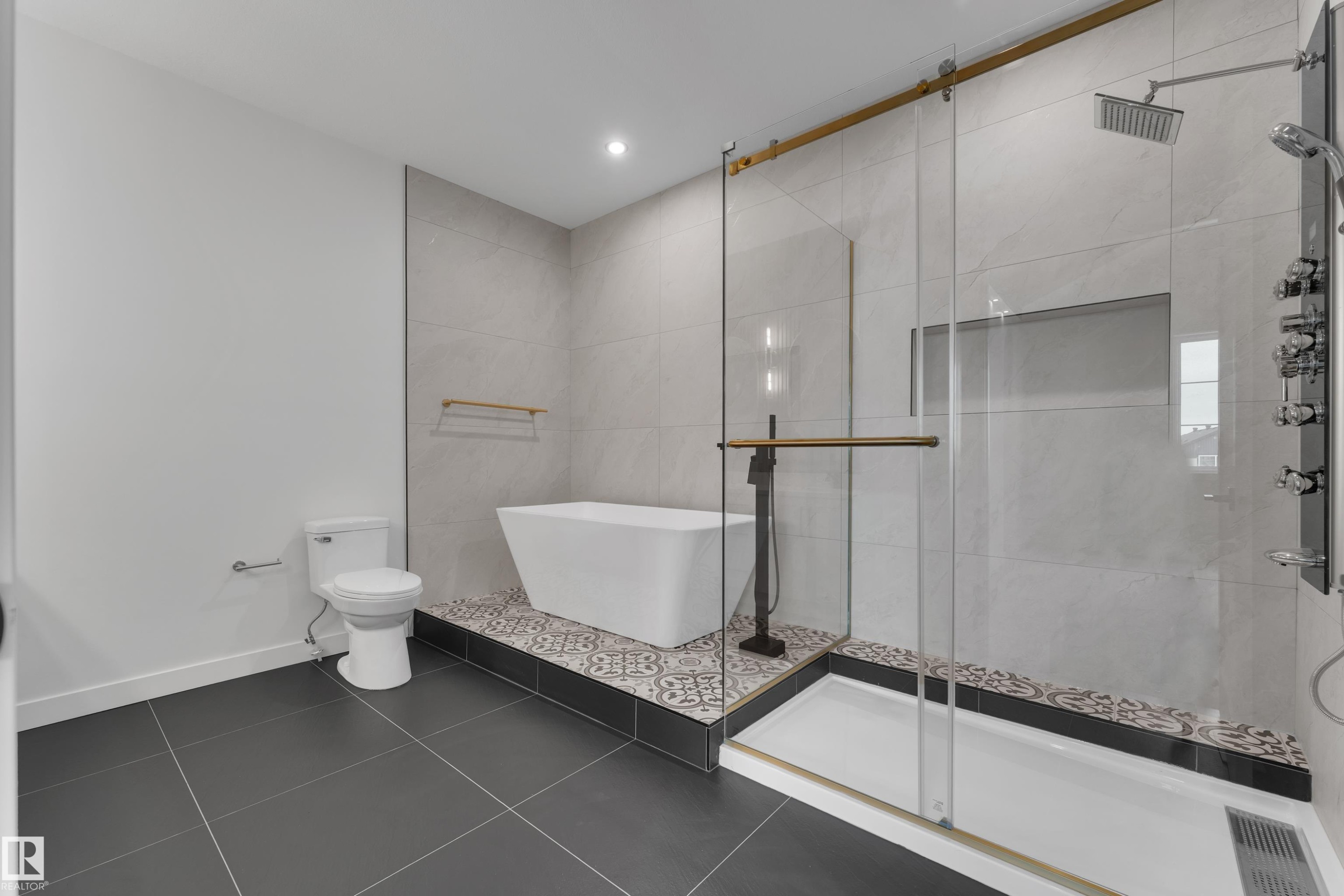 Bathroom featuring a shower stall, a soaking tub, dark tile patterned flooring, and recessed lighting - 40 Grayson Green, Stony Plain, AB - Indoor Photo Showing Bathroom